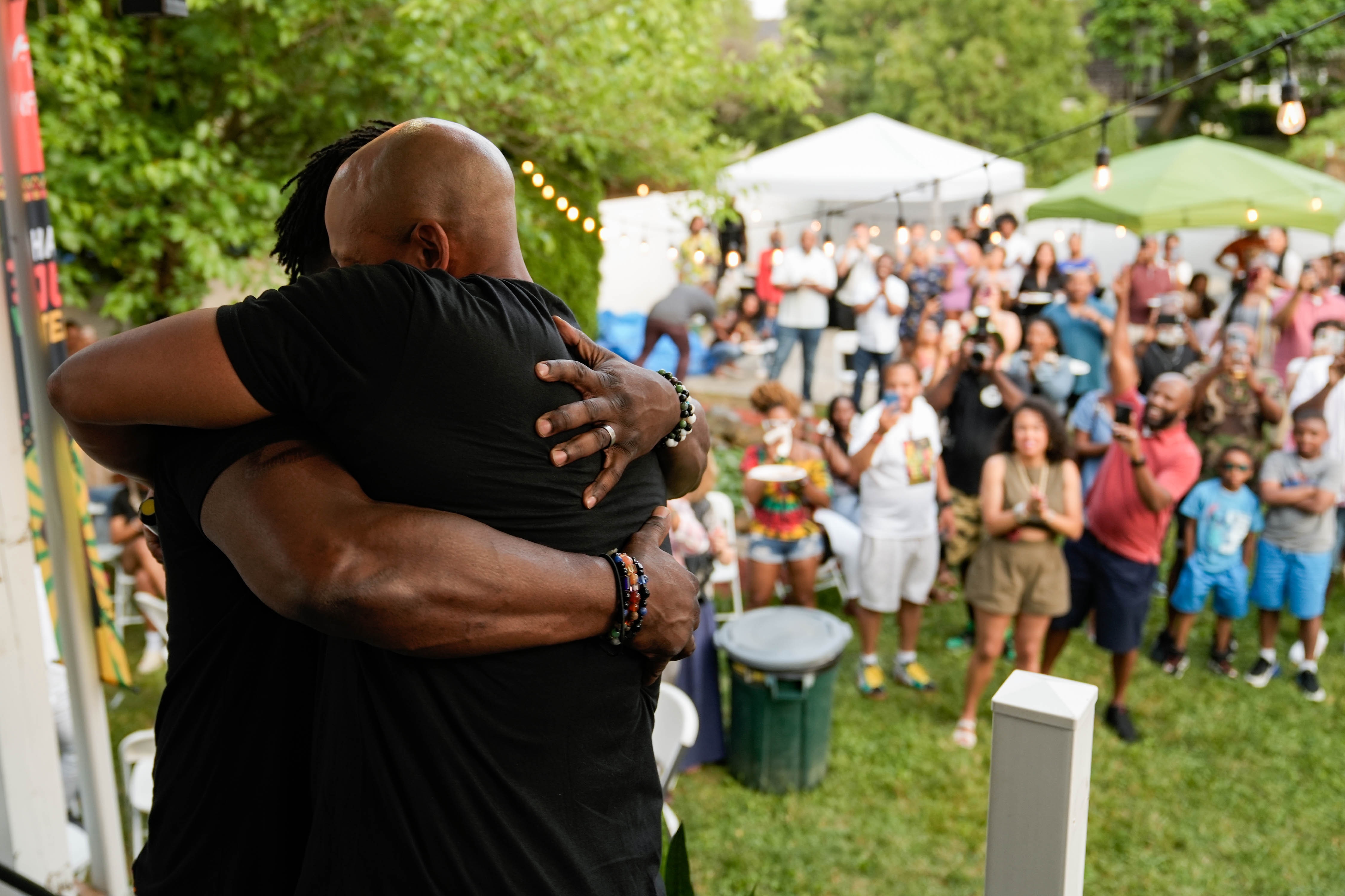 Malcolm Ruff hugs Wes Moore after Moore announced he was appointing Ruff as the 41st district's delegate in Maryland's House of Delegates at Ruff's annual Juneteenth celebration on Saturday, June 17, 2023. Ruff pledged to do everything he could for West Baltimore.