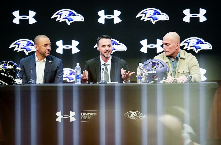 From left, Ravens President Sashi Brown, newly hired head coach Jesse Minter and GM/Executive Vice President Eric DeCosta hold a news conference announcing Minter’s hiring on Thursday at the Under Armour Performance Center.