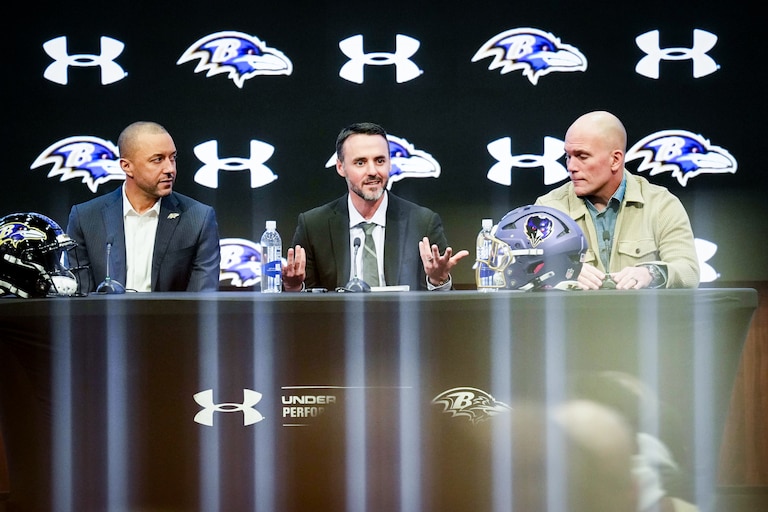 From left, Ravens President Sashi Brown, newly hired head coach Jesse Minter and GM/Executive Vice President Eric DeCosta hold a news conference announcing Minter’s hiring on Thursday at the Under Armour Performance Center.