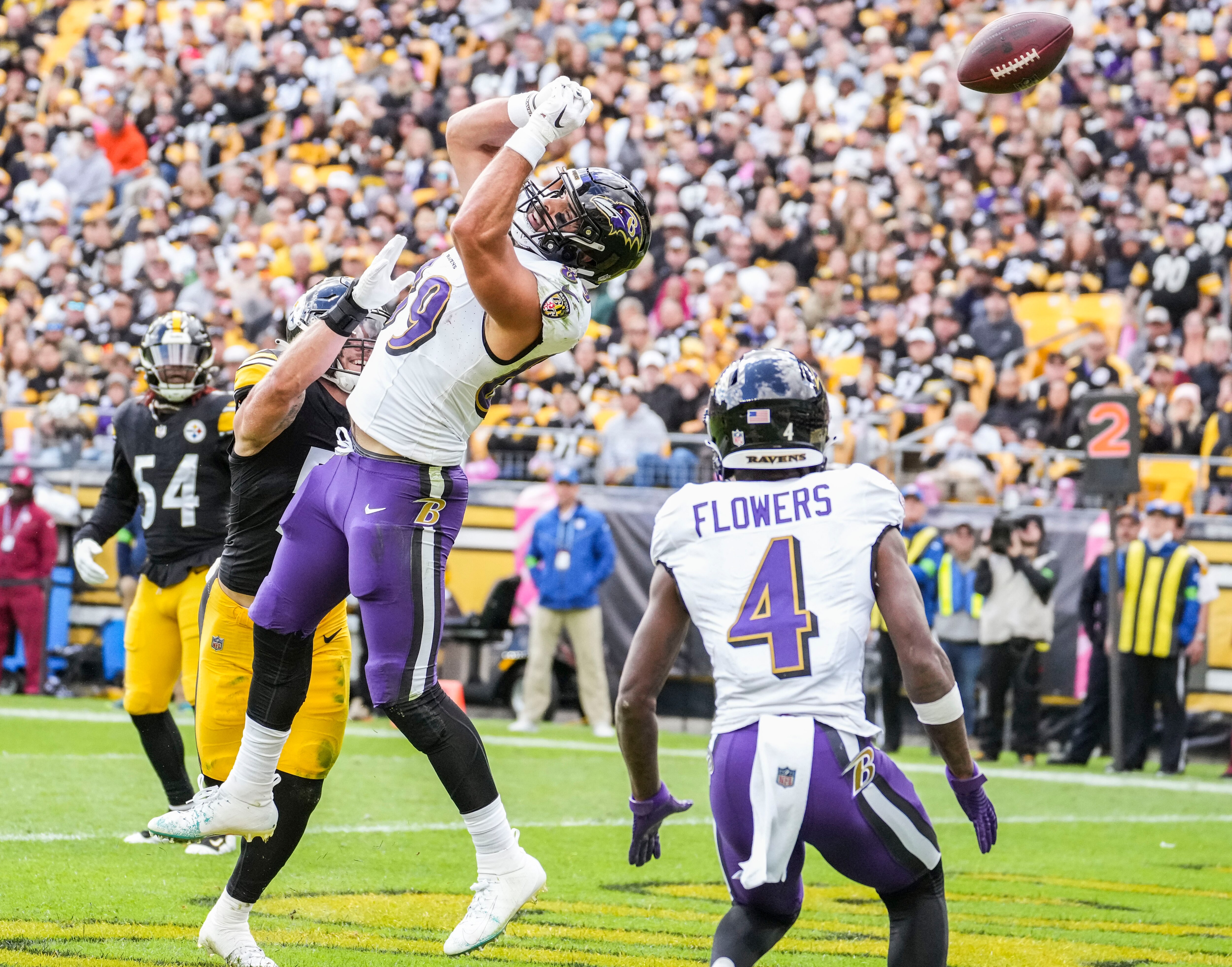 A pass goes through the hands of Ravens tight end Mark Andrews on Sunday during a 17-10 loss at Pittsburgh.