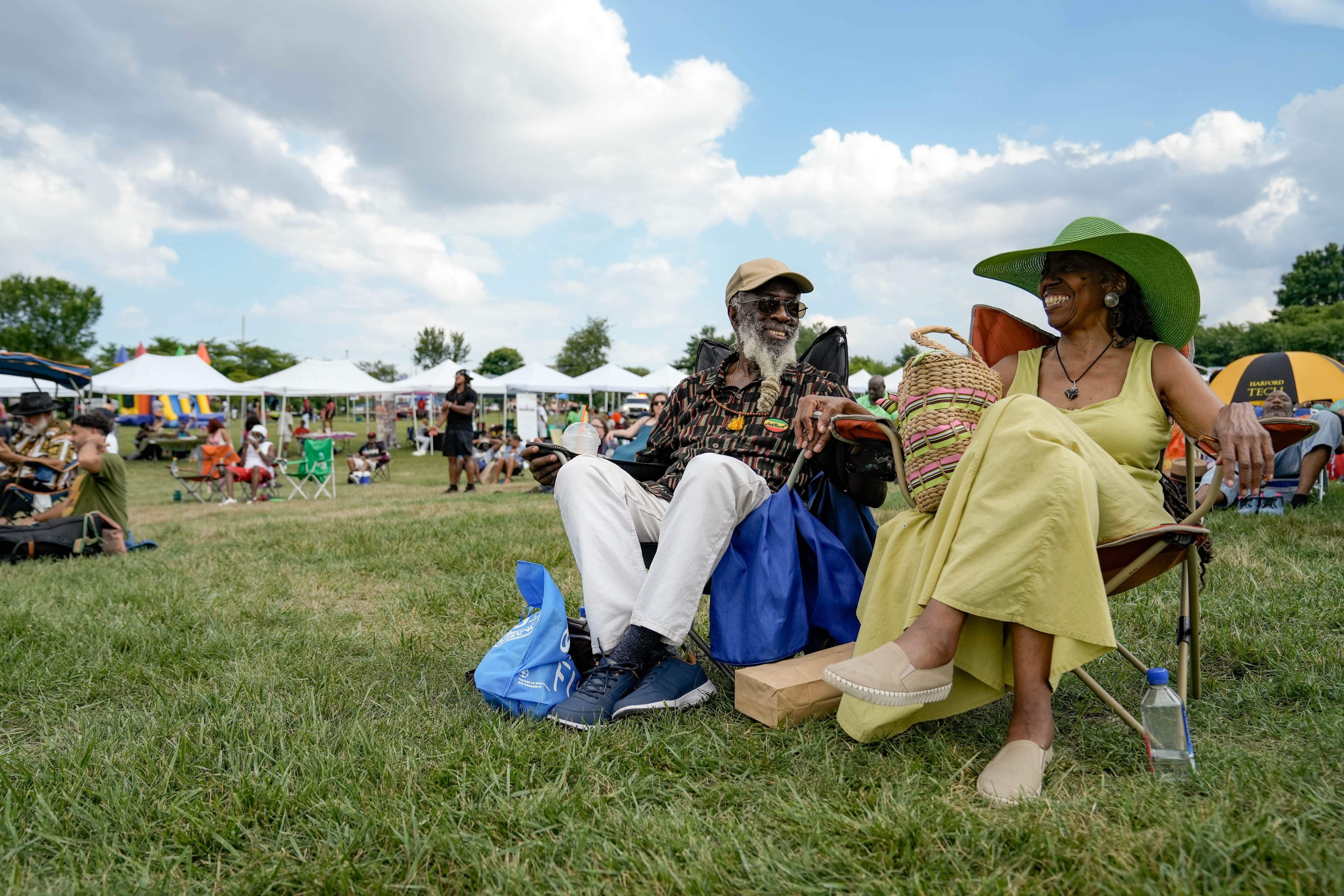 Henry Gregory and Jolynn Brooks sit together at the Cherry Hill Arts & Music Waterfront Festival on July 4, 2023.