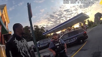 A still from body camera footage released by Howard County Police Department show a suspect accused of burglarizing a Verizon store who later called the police to report his car stolen.