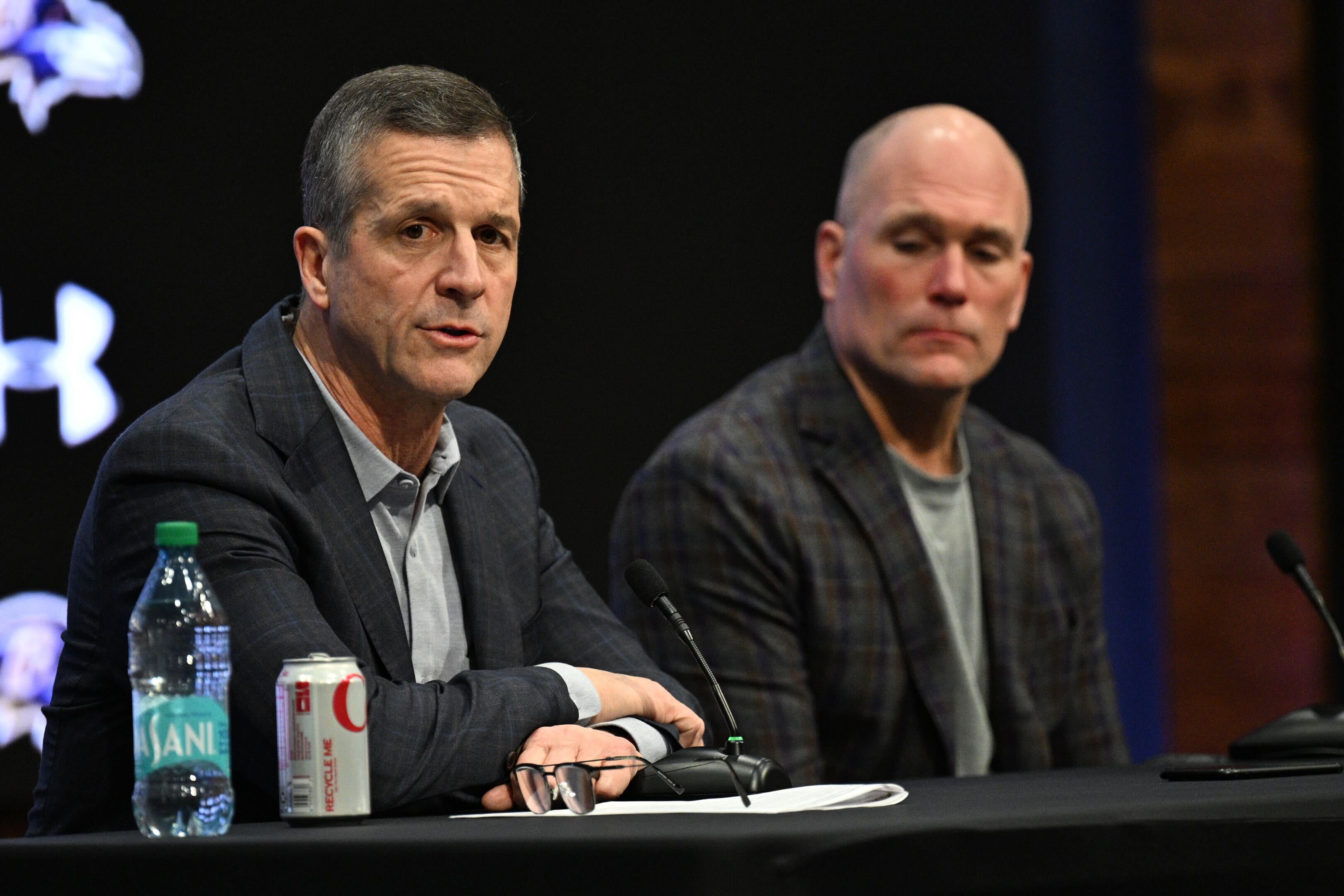 Ravens general manager Eric DeCosta, right, and head coach John Harbaugh hold a season review press conference Wednesday at the Under Armour Performance Center in Owings Mills.