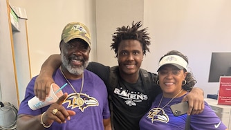 Zion Young, center, with his parents Frank Young and Shirley Reese after Zion's first preseason Ravens game against the Philadelphia Eagles.