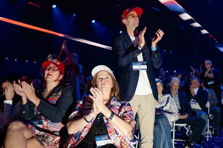 Attendees applaud during Turning Point USA's AmericaFest 2025, Saturday, Dec. 20, 2025, in Phoenix.