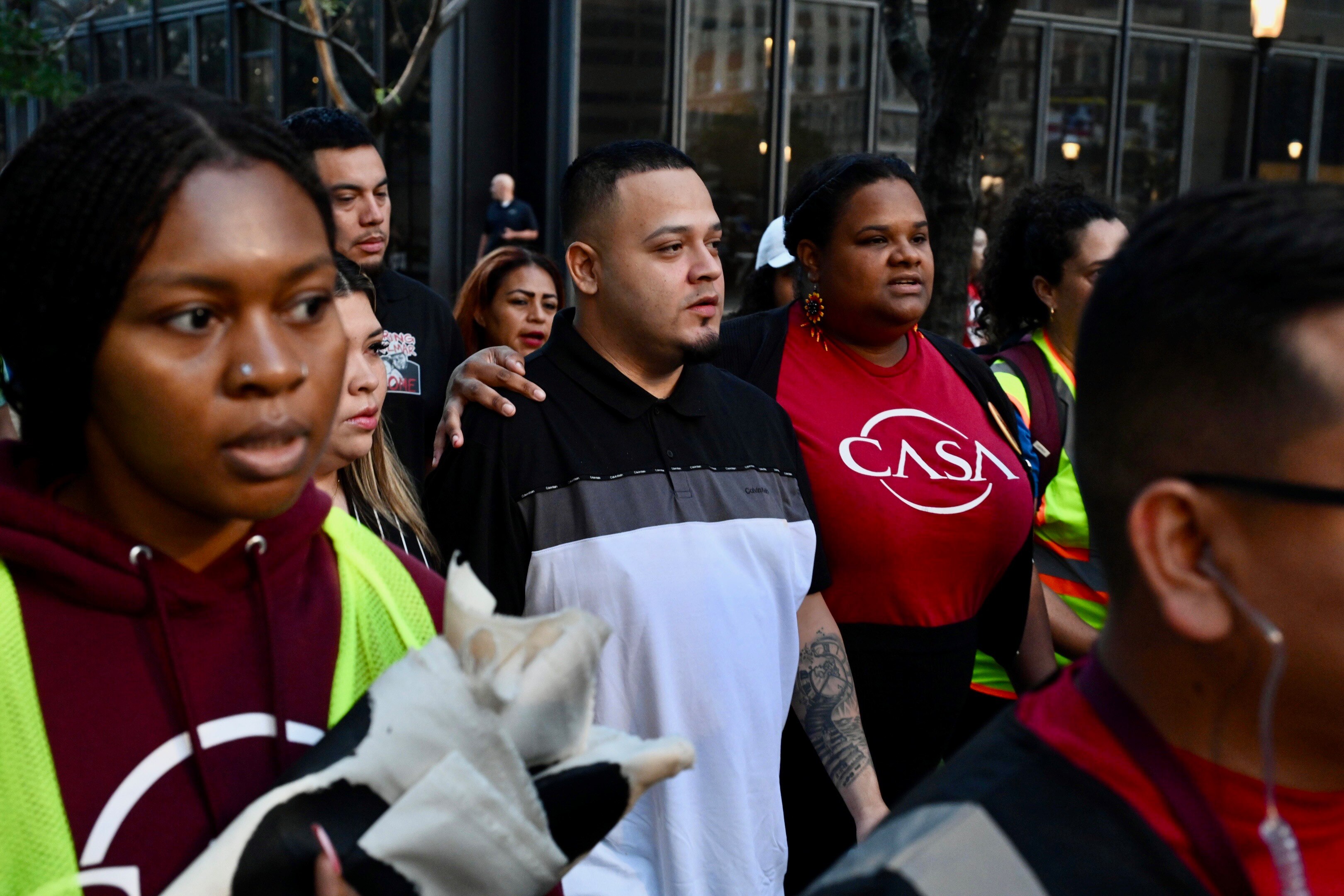 Kilmar Abrego Garcia, center, arrives with his wife Jennifer, left, to the George H. Fallon Federal Building in downtown Baltimore on Monday, August 25, 2025.