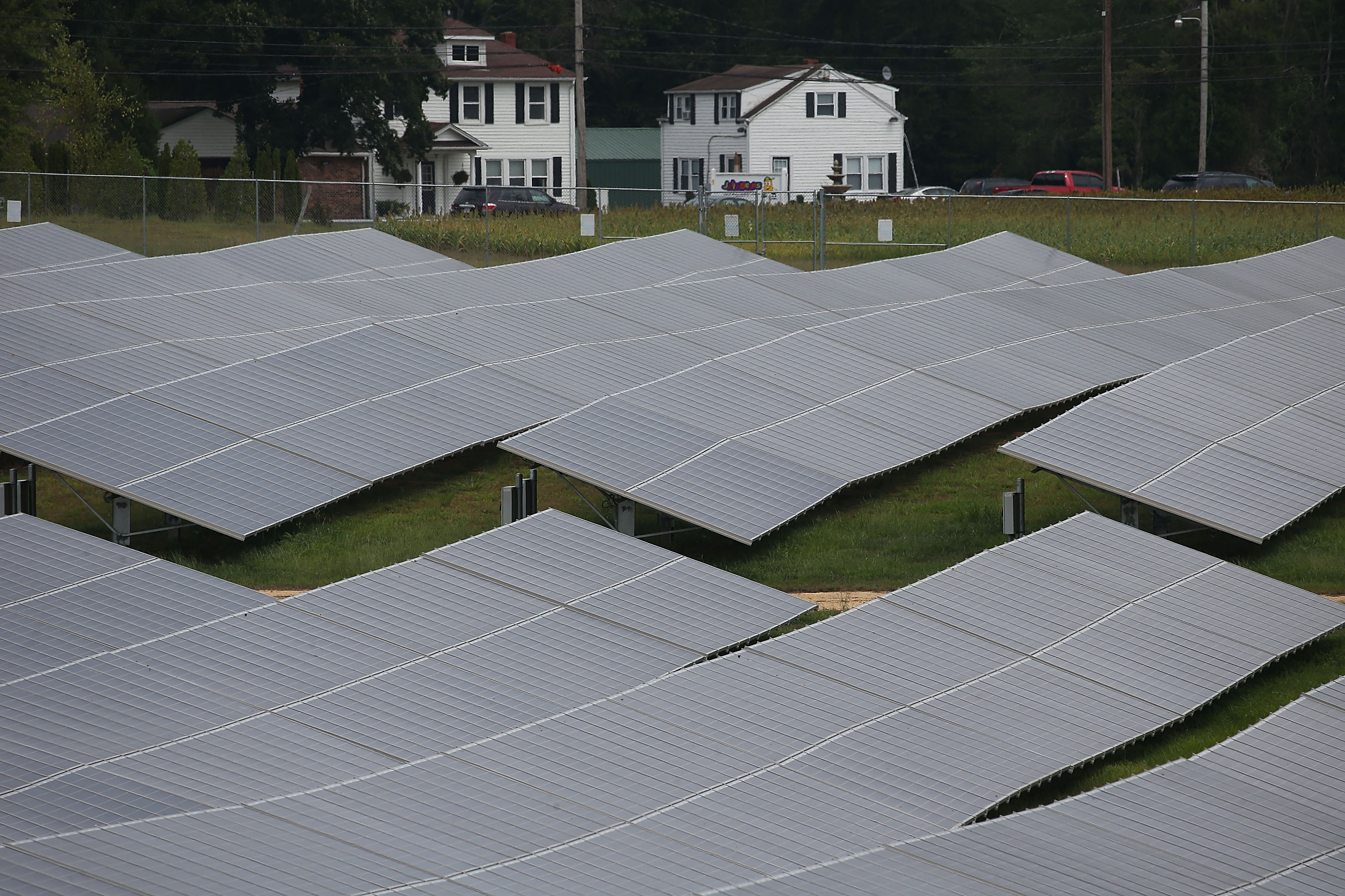 Solar panels are seen at a solar farm owned and operated by Southern Maryland Electric Cooperative Solar llc. August 20, 2015 in Hughsville, Maryland. The 5.5-megawatt farm went online in 2012 with its 23,176 solar panels that cover 33 acres, and at maximum production can supply enough electricity to supply 600 homes.
