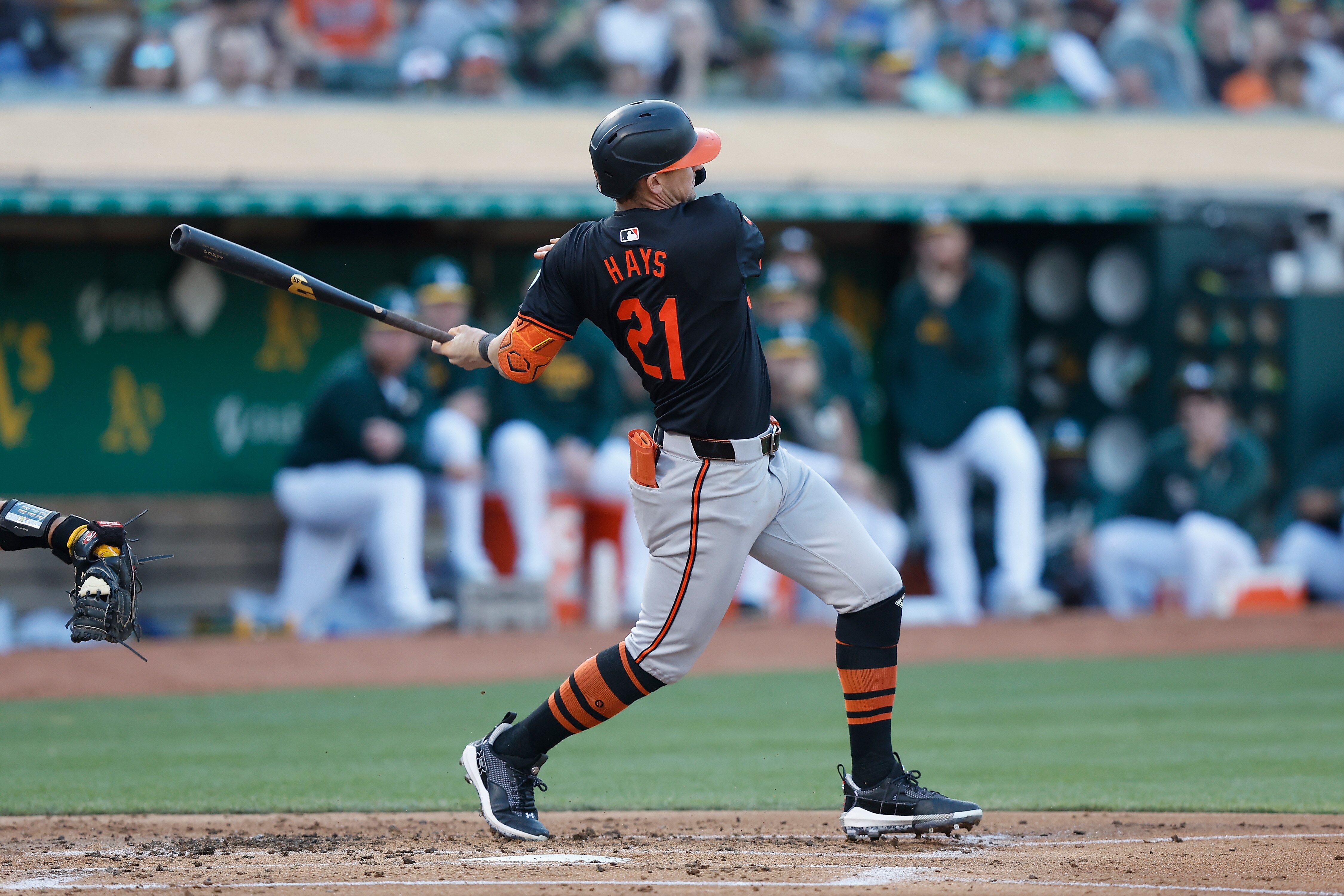 Austin Hays lashes an RBI double in the top of the second inning Friday night in Oakland.