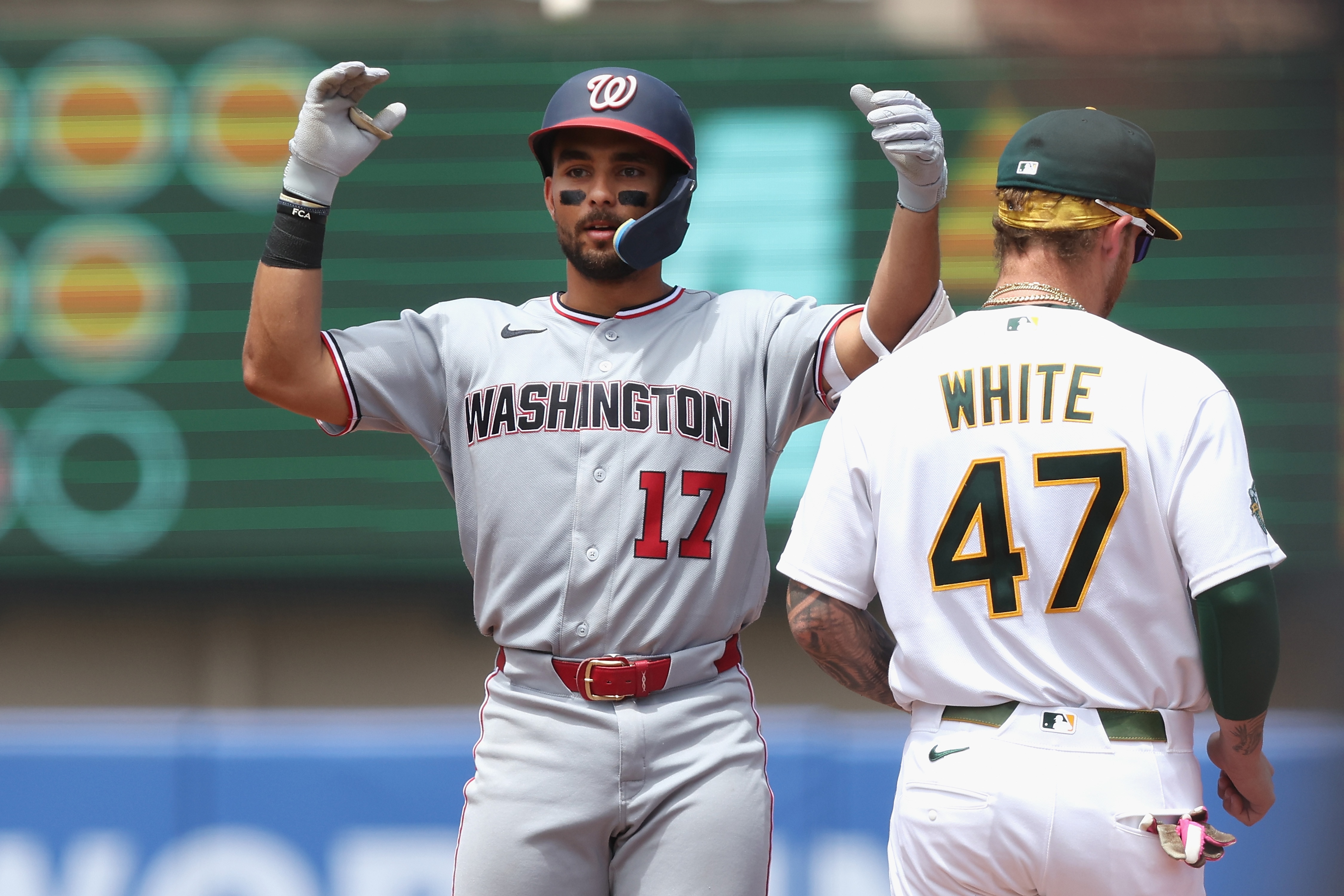 Harry Ford gestures to the dugout after his RBI double in the top of the fourth inning Sunday against the Athletics.