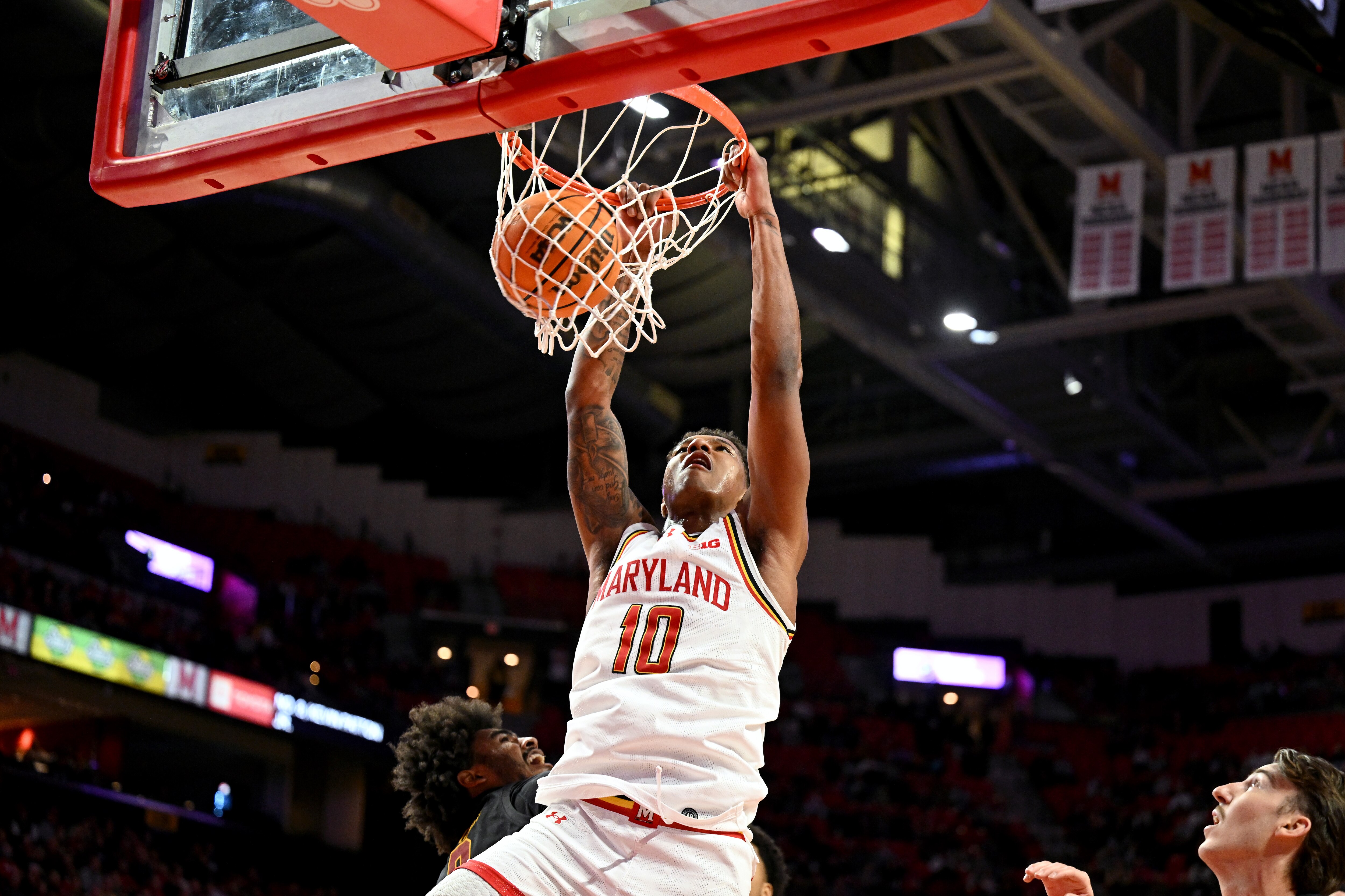 Julian Reese of Maryland dunks in the second half against USC on Thursday night in College Park.