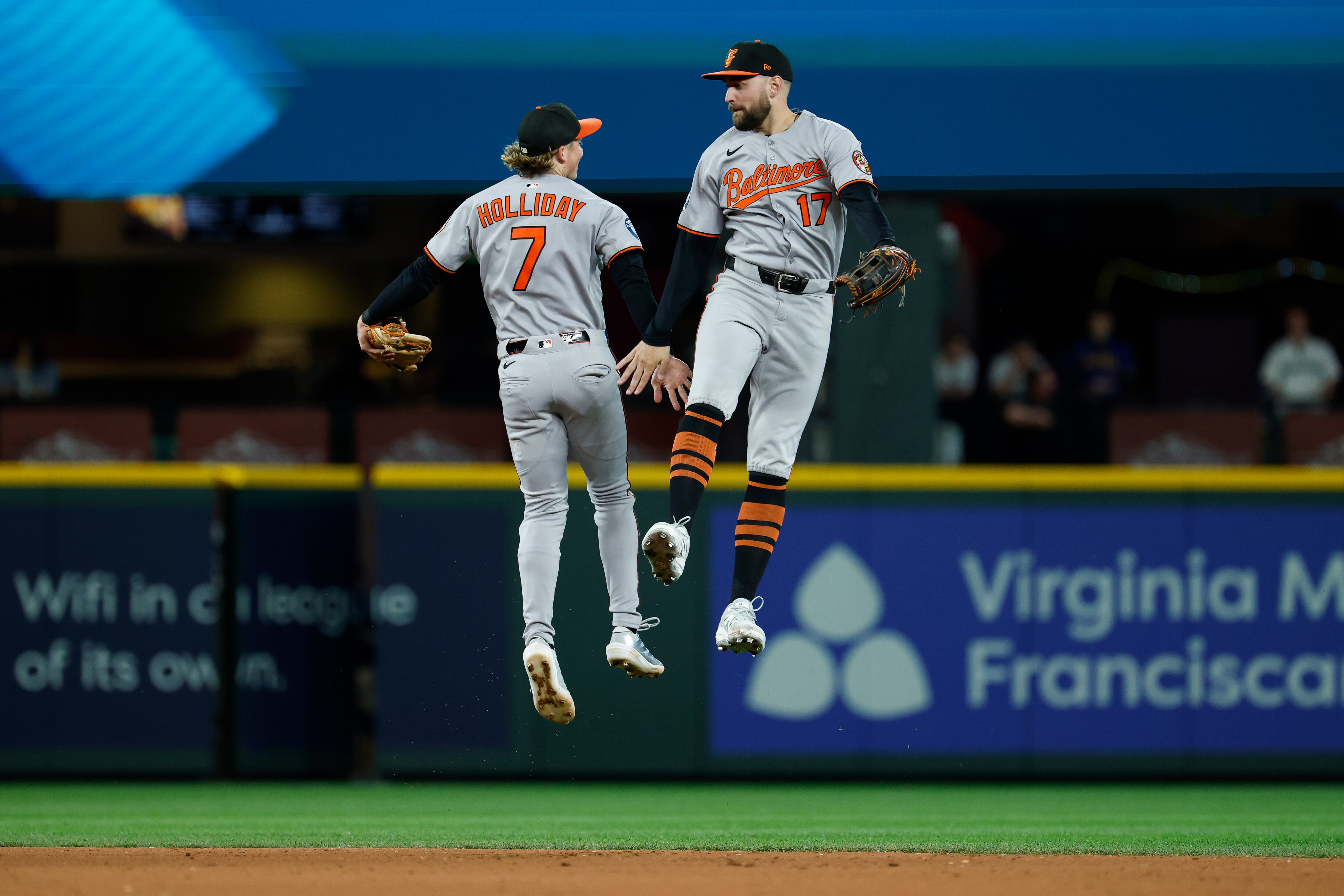 Second baseman Jackson Holliday and outfielder Colton Cowser celebrate the Orioles’ win Wednesday in Seattle, one of six straight.