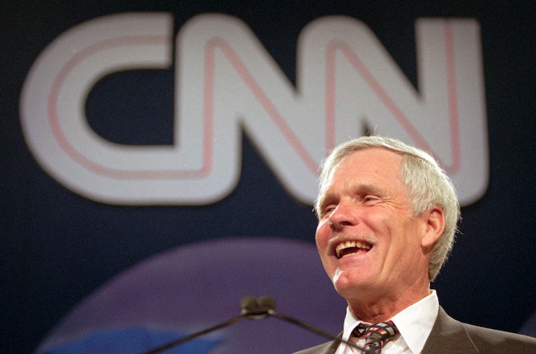 Ted Turner speaks during the CNN World Report Contributors banquet in Atlanta on May 4, 1995.