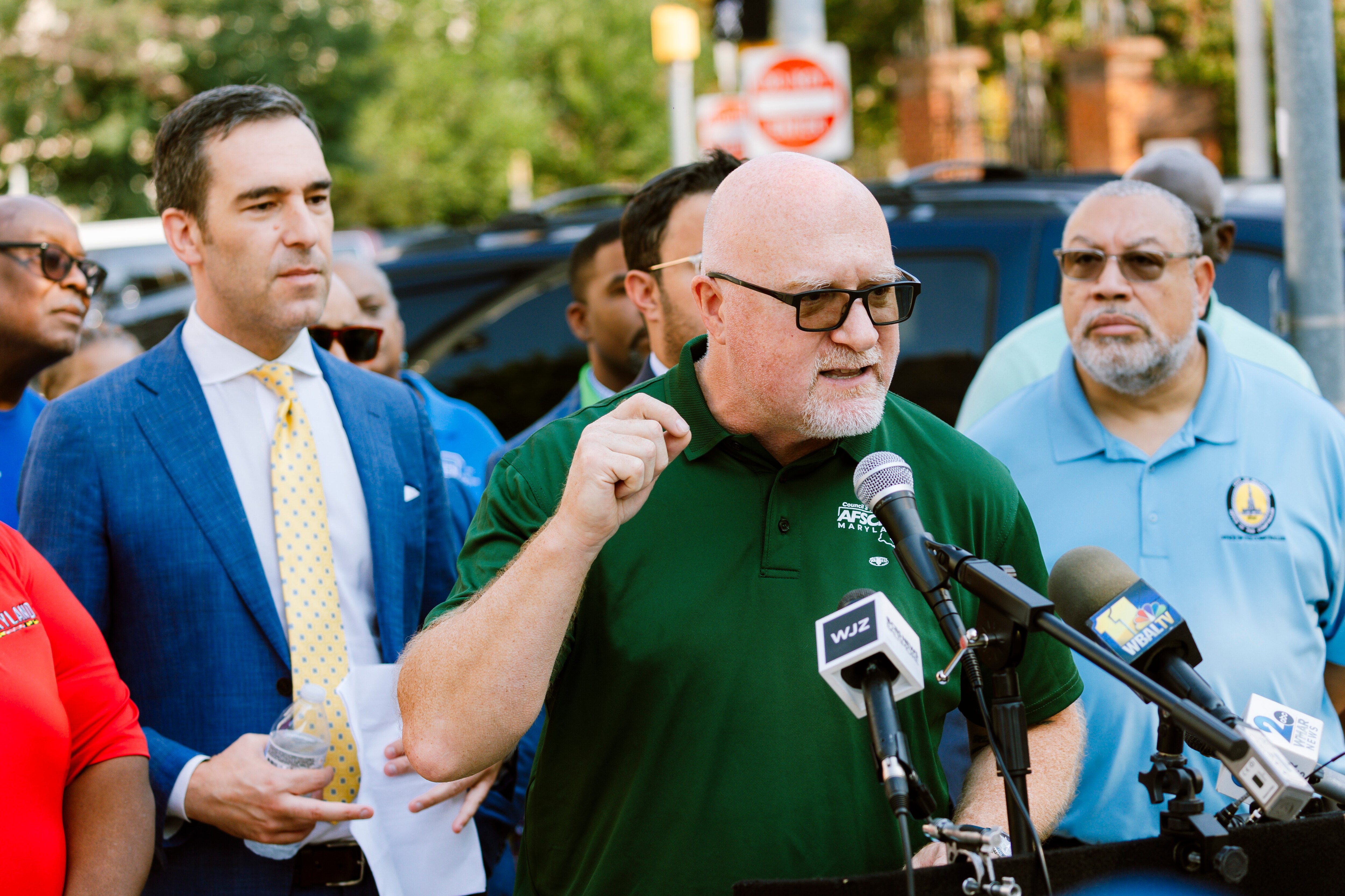 Patrick Moran, President of AFSCME Maryland Council 3, decries working conditions at the Department of Public Works at a press conference following the death of Ronald Silver II, who was on the job with the DPW's Bureau of Solid Waste when he died, outside of City Hall on Tuesday, Aug. 6, 2024 in Baltimore, MD.