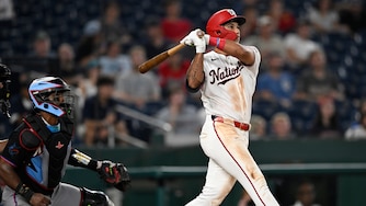 Washington Nationals' Daylen Lile watches his two-run home run go over the right field fence during the seventh inning.