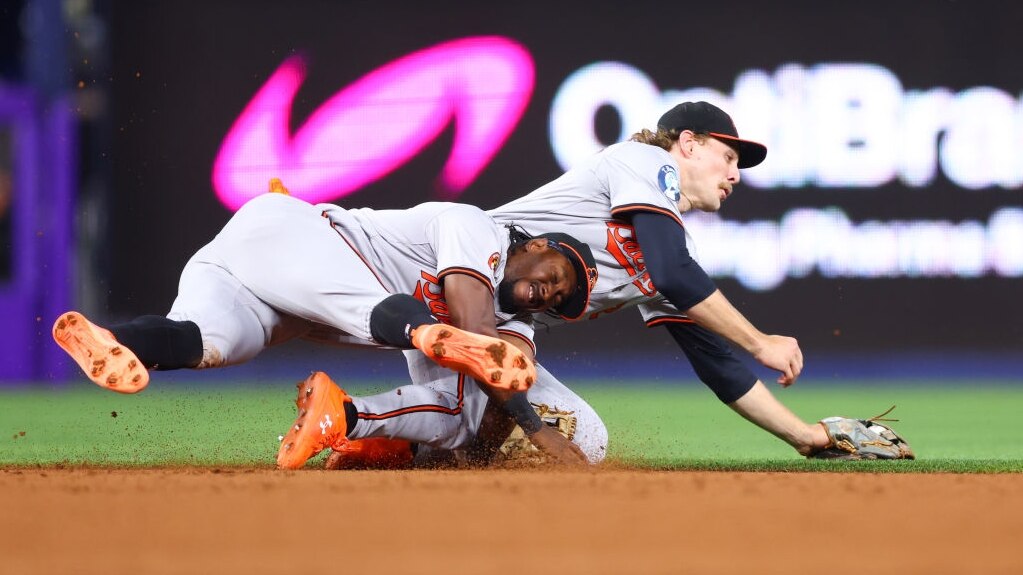 MIAMI, FLORIDA - JULY 23: Jorge Mateo #3 and Gunnar Henderson #2 of the Baltimore Orioles collide during the third inning of the game against the Miami Marlins at loanDepot park on July 23, 2024 in Miami, Florida. (Photo by Megan Briggs/Getty Images)