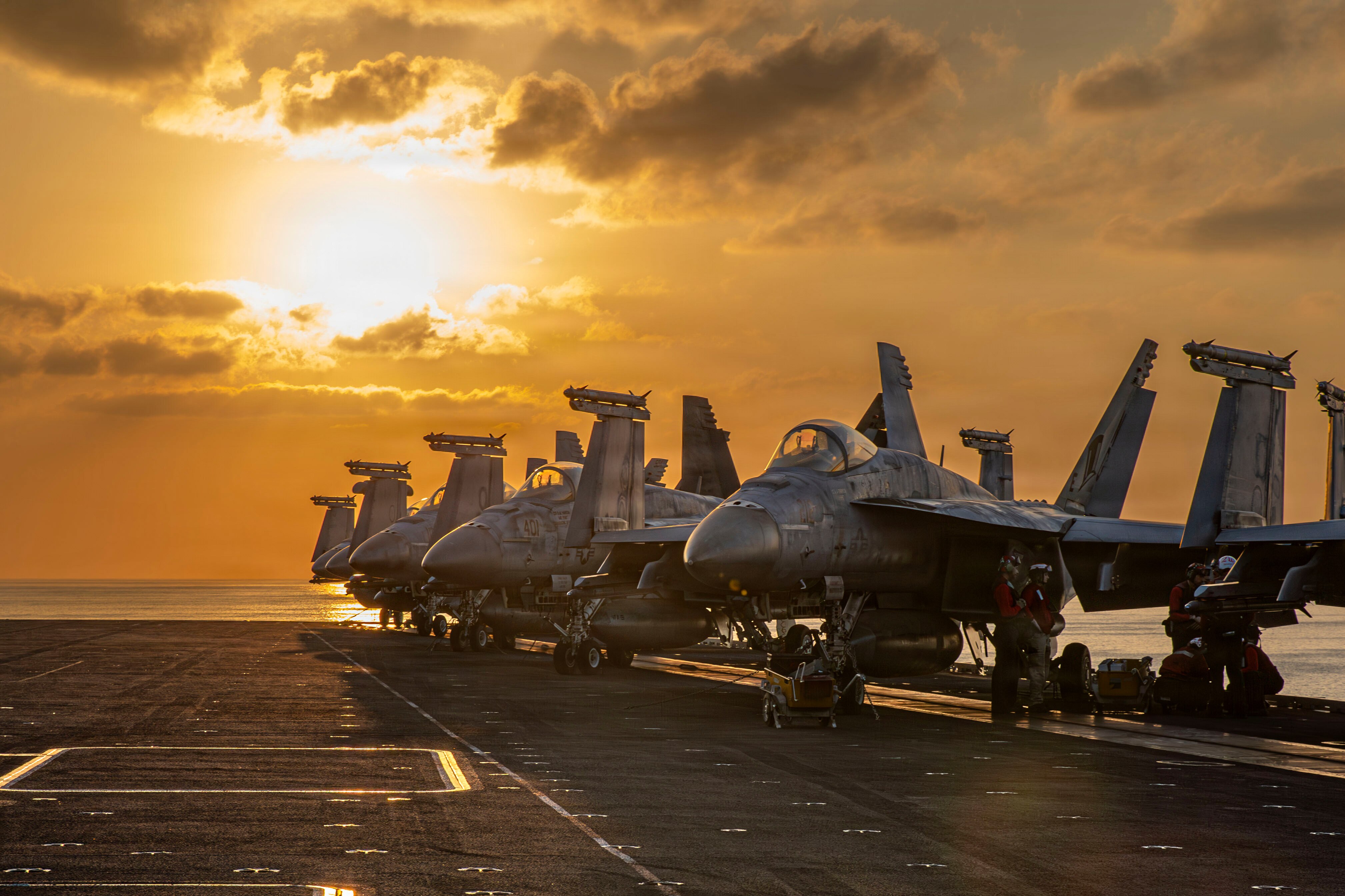 This image provided by U.S. Central Command shows aircraft on the flight deck of the USS Abraham Lincoln (CVN 72) that are operating in support of the war in Iran, on Tuesday, March 3, 2026. (U.S. Navy via AP)