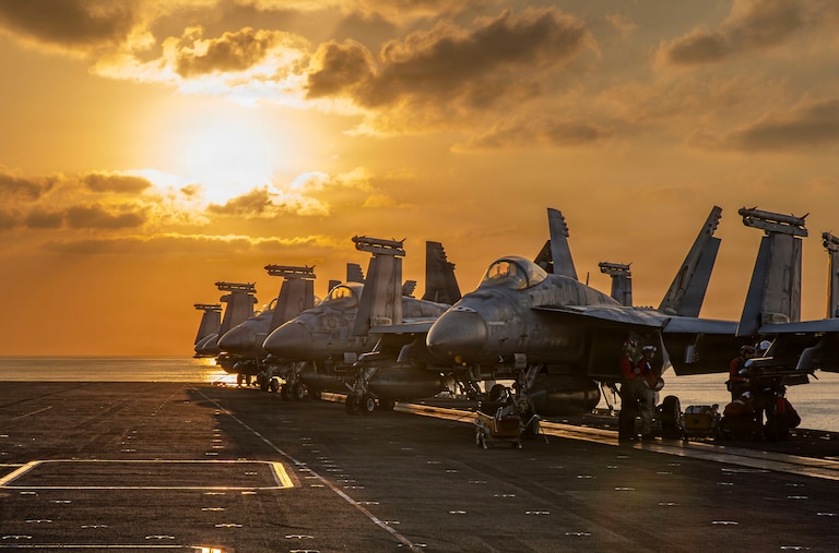 This image provided by U.S. Central Command shows aircraft on the flight deck of the USS Abraham Lincoln (CVN 72) that are operating in support of the war in Iran, on Tuesday, March 3, 2026. (U.S. Navy via AP)