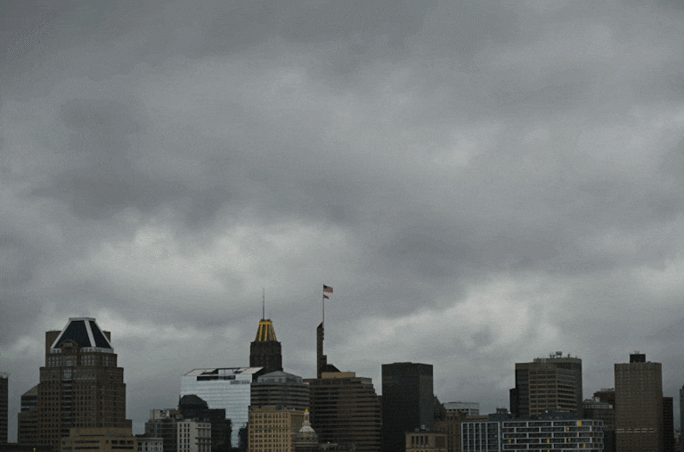 Storm clouds move past the Baltimore city skyline on Monday as severe storms prompt tornado watches and warnings across the state.