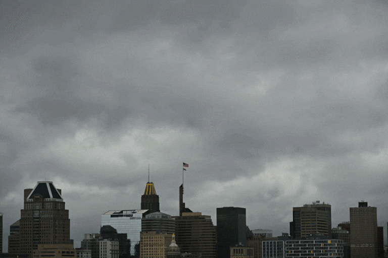 Storm clouds move past the Baltimore city skyline on Monday as severe storms prompt tornado watches and warnings across the state.