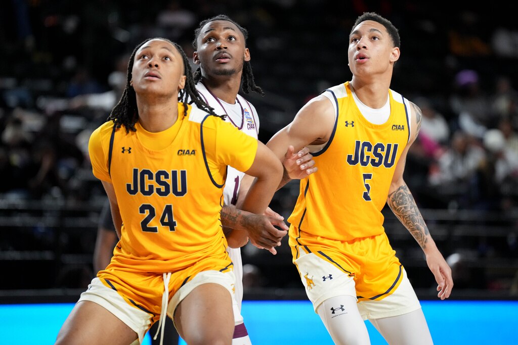 Johnson C. Smith’s Justin Bumbray (5), right, works with teammate Jared Davis (24) to box out Virginia Union’s Bobby Gardner (1) in the second half of a CIAA Men’s Quarterfinal game at CFG Bank Arena in Baltimore, Md., on Thursday, February 26, 2026.
