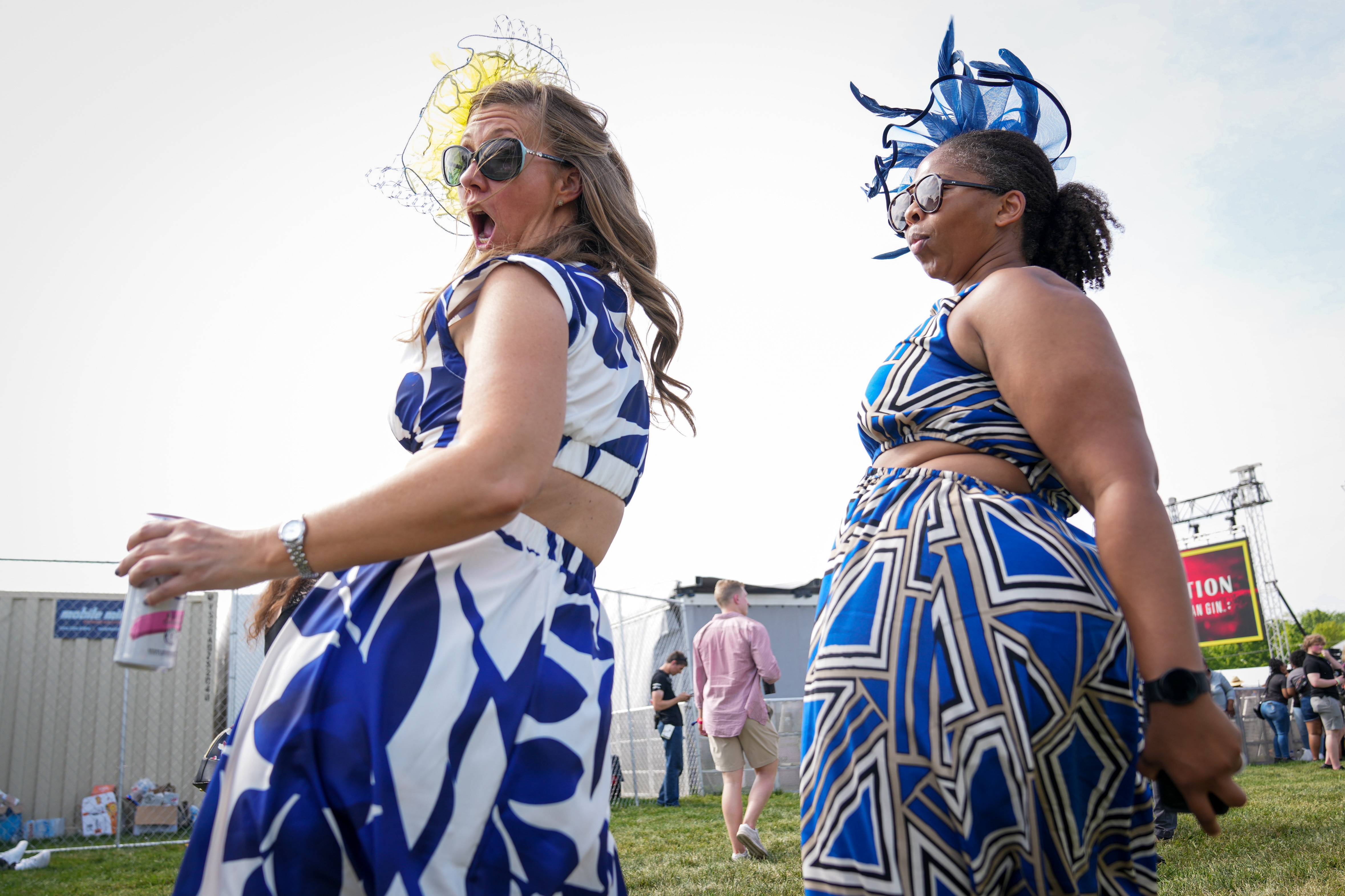Attendees dance at the Preakness Stakes at Pimlico Race Course in May 2023.