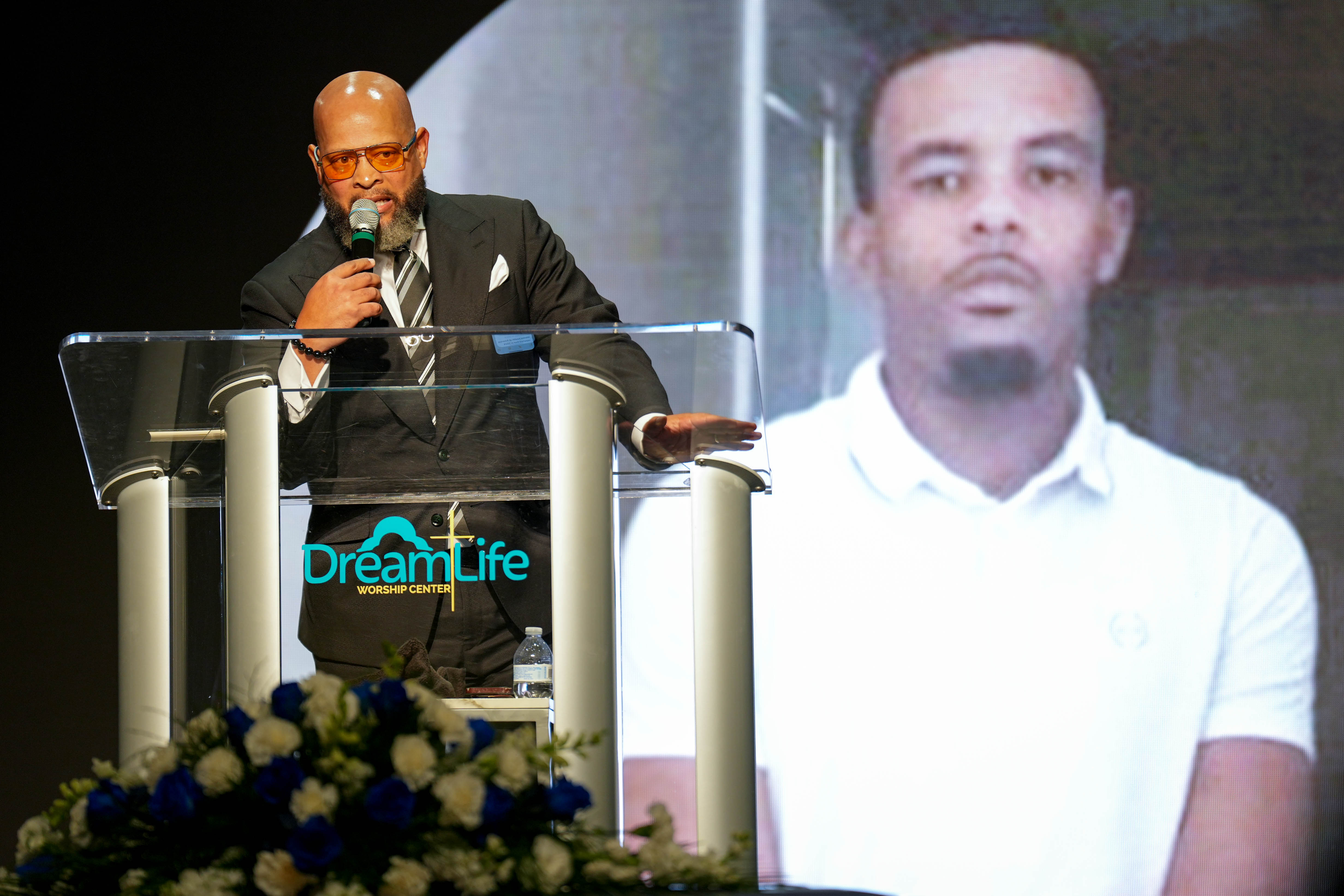Pastor Markus McAllister delivers the eulogy at Dontae Melton Jr.’s funeral at DreamLife Worship Center in Randallstown, Md. on Saturday, July 12, 2025. The 31-year-old died in police custody in June, just one day after his mother had attempted to file an emergency petition in court out of concern for his mental health.