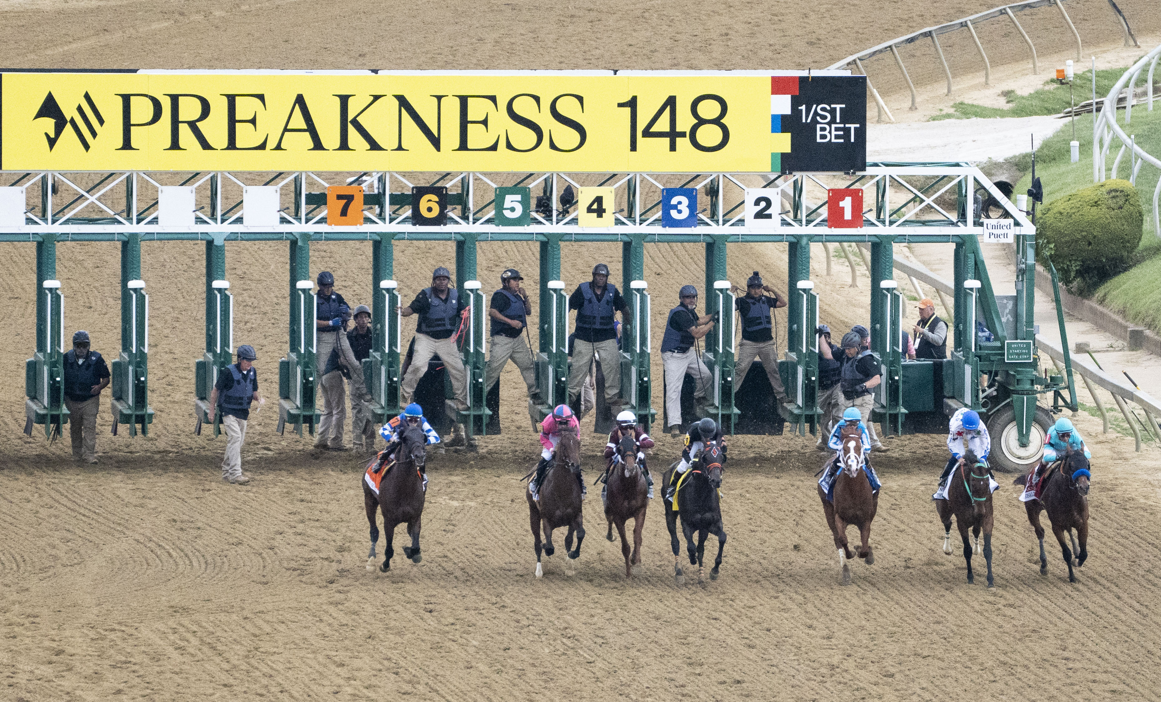 National Treasure (far right), ridden by jockey John Velazquez, wins the Preakness Stakes at Pimlico Race Course  on May 20.