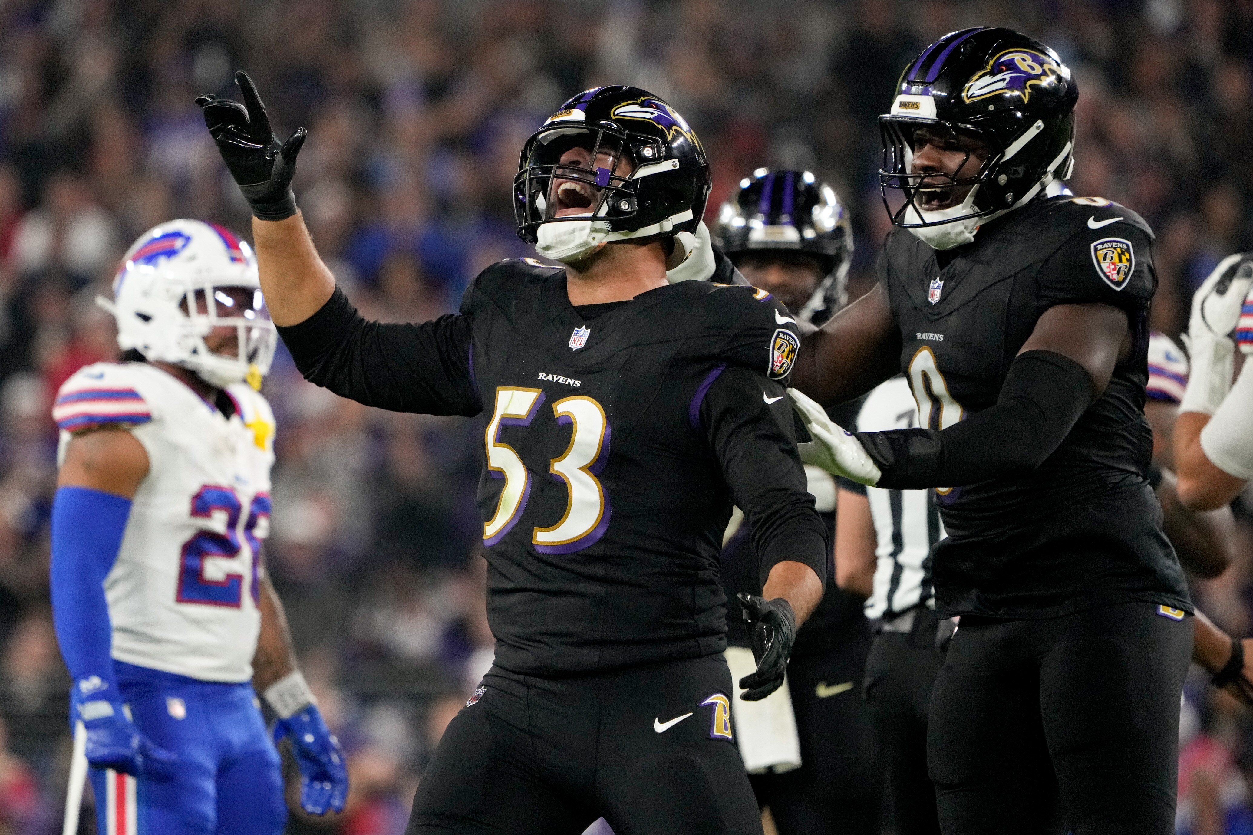 Ravens outside linebacker Kyle Van Noy celebrates one of his two sacks of the Bills’ Josh Allen on Sunday night.