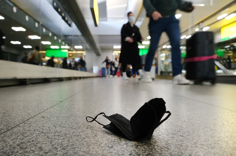 A mask is seen on the ground at John F. Kennedy Airport.