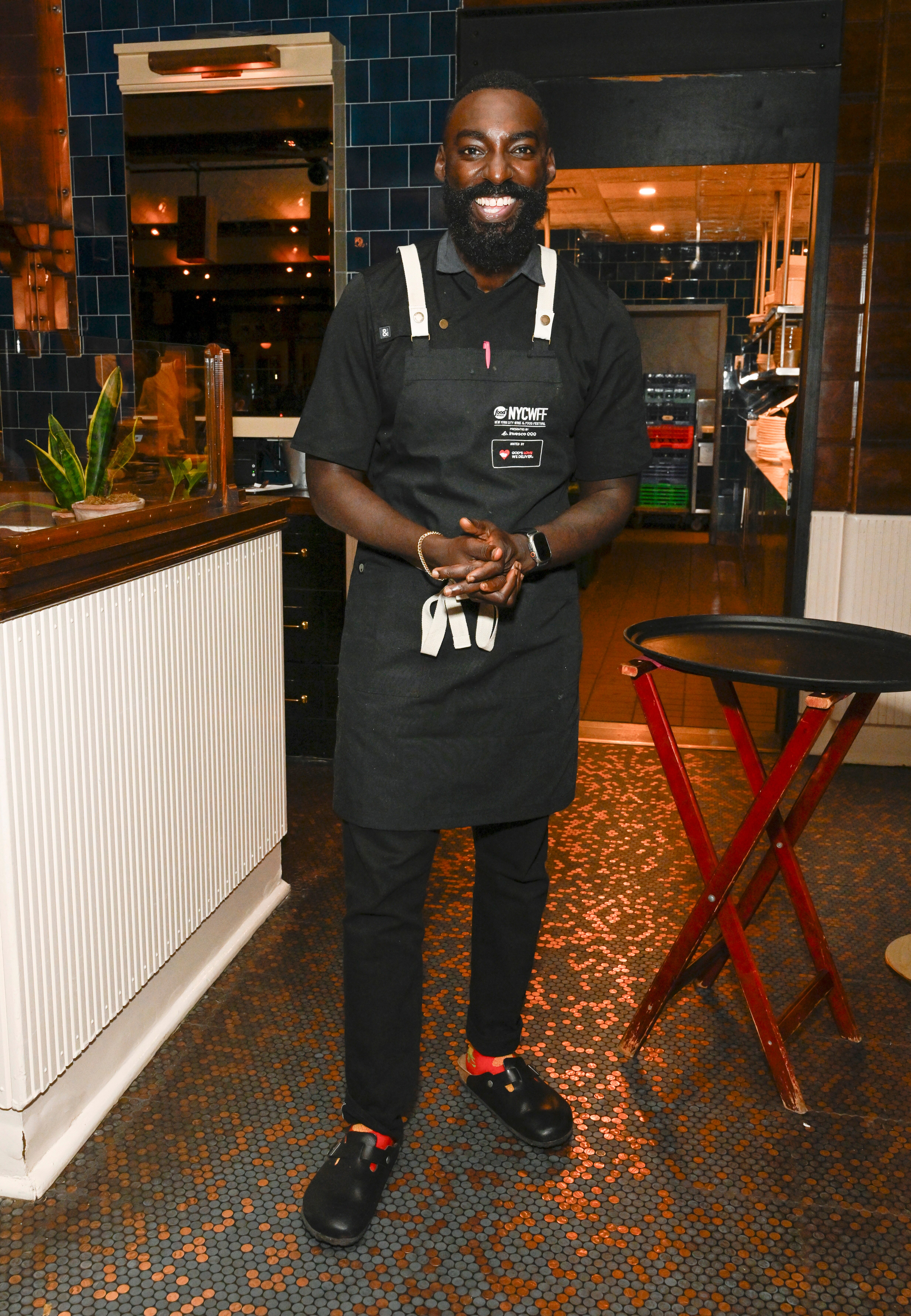 NEW YORK, NEW YORK - OCTOBER 19: Chef Eric Adjepong poses during the Food Network New York City Wine & Food Festival Dinner hosted by Eric Adjepong and Tiffani Faison as part of the Invesco Dining Series at The Standard Grill presented by Invesco QQQ on October 19, 2024 in New York City. (Photo by Daniel Zuchnik/Getty Images for NYCWFF)