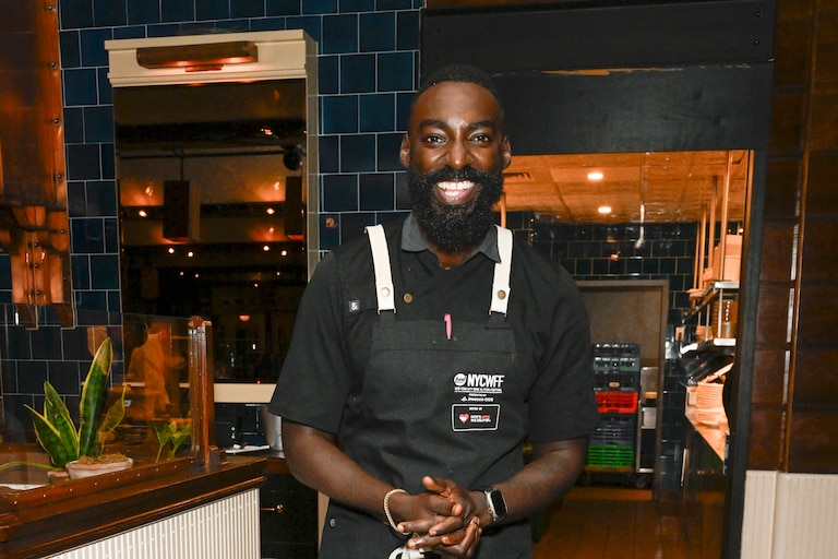 NEW YORK, NEW YORK - OCTOBER 19: Chef Eric Adjepong poses during the Food Network New York City Wine & Food Festival Dinner hosted by Eric Adjepong and Tiffani Faison as part of the Invesco Dining Series at The Standard Grill presented by Invesco QQQ on October 19, 2024 in New York City. (Photo by Daniel Zuchnik/Getty Images for NYCWFF)