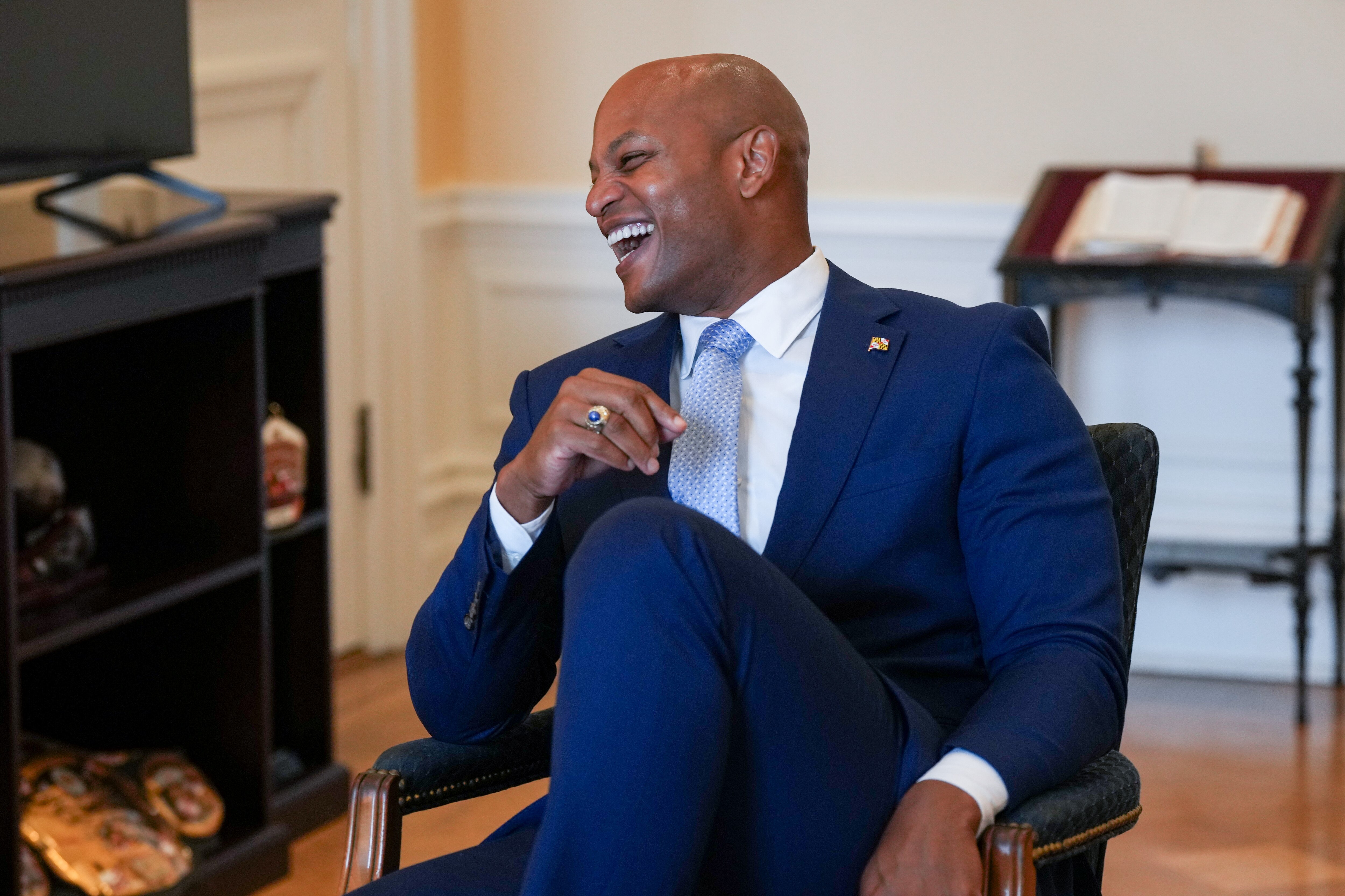Gov. Wes Moore laughs during an interview with The Baltimore Banner in his office on June 29, 2023, at the Maryland State House.
