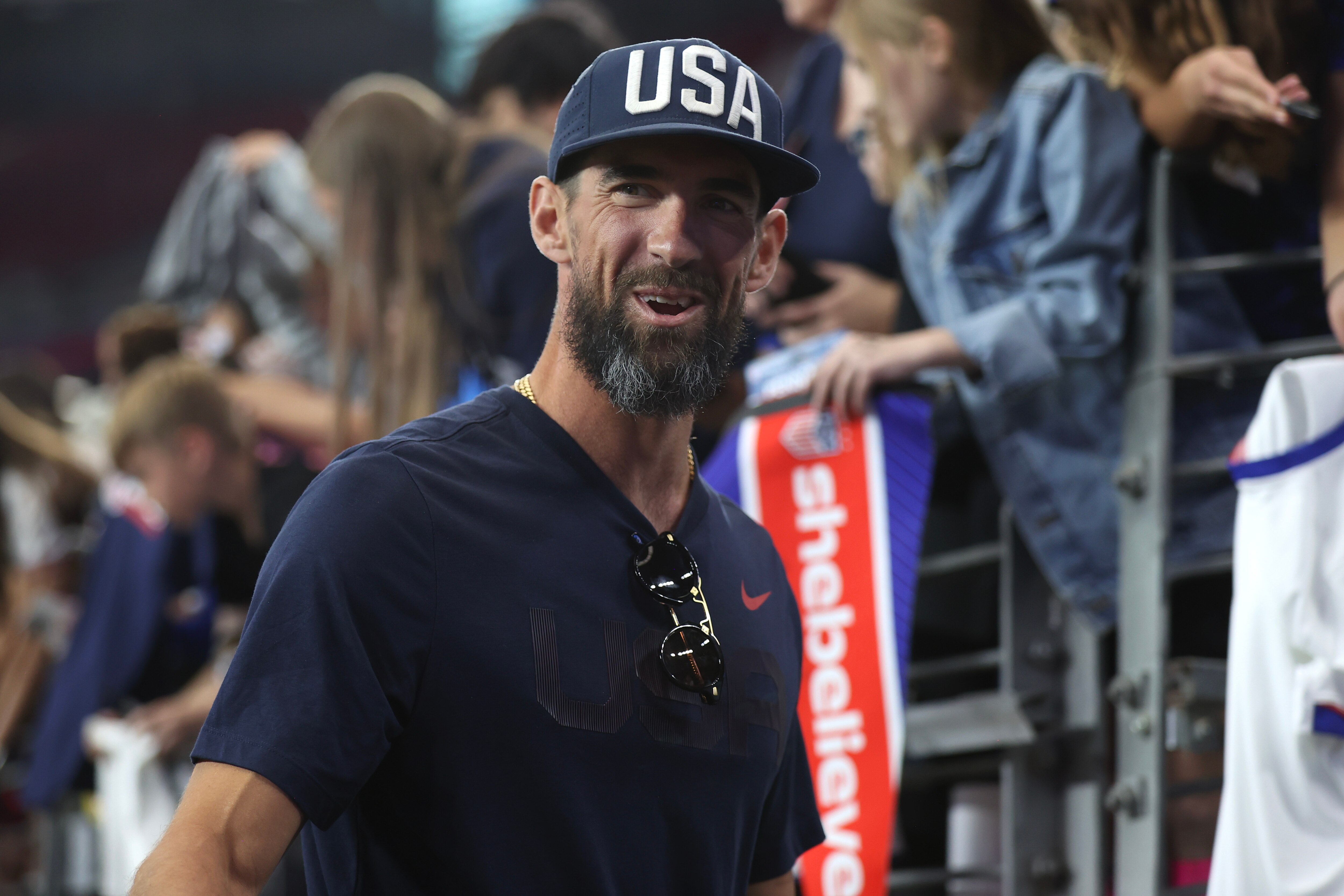 GLENDALE, ARIZONA - FEBRUARY 23: Former U.S. Olympic swimmer Michael Phelps walks down the sideline after the 2025 SheBelieves Cup at State Farm Stadium between the United States and Australia on February 23, 2025 in Glendale, Arizona.