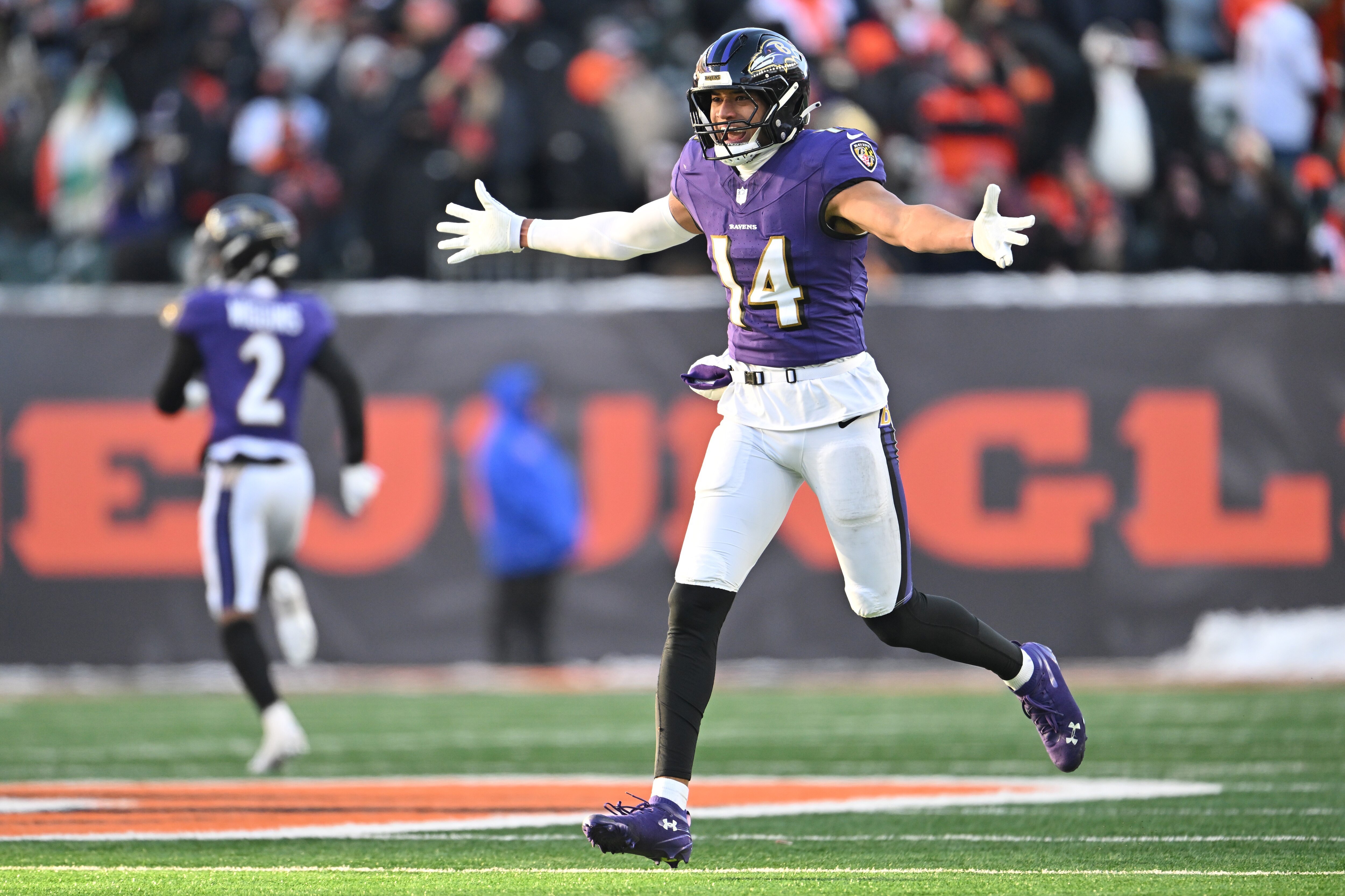 CINCINNATI, OHIO - DECEMBER 14: Kyle Hamilton #14 of the Baltimore Ravens celebrates after teammate Kyle van Noy #53 scores a touchdown off of an interception during the fourth quarter against the Cincinnati Bengals at Paycor Stadium on December 14, 2025 in Cincinnati, Ohio. (Photo by Jason Miller/Getty Images)