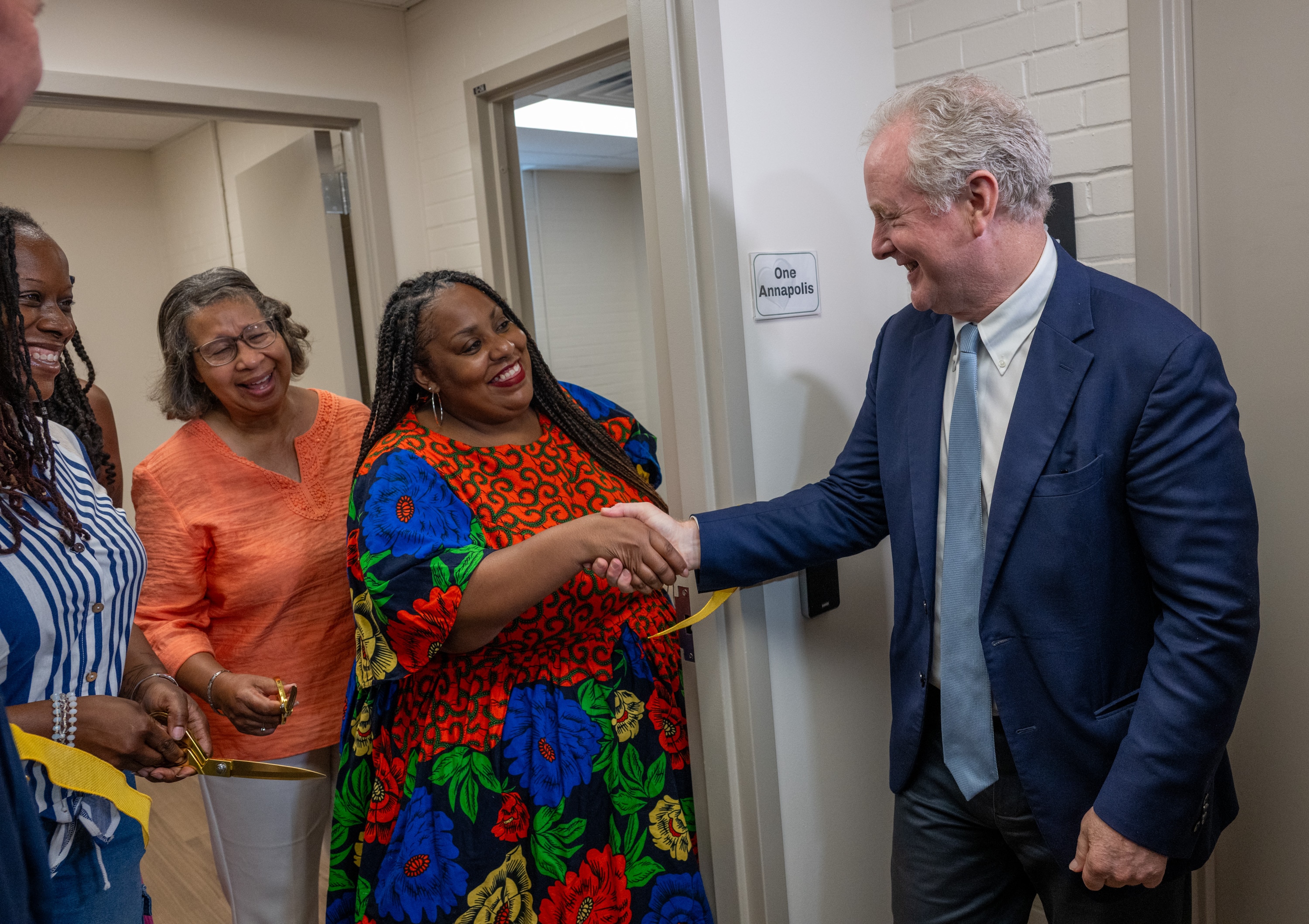 Ratasha Harley, founder and executive director of One Annapolis, is congratulated by Sen. Chris Van Hollen following Monday's ribbon cutting to celebrate the opening of the Nonprofit Center in Crownsville.