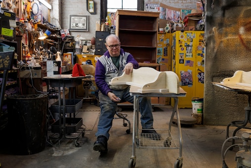 Thursday, Feb. 12, 2026, in Baltimore , MD— John Fisher finishing a shelf at McLain Wiesand furniture in Mount Vernon.