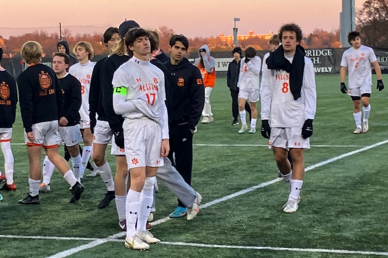 Fallston senior Christian Worthington stands dejectedly before the start of Saturday's Class 1A state boys soccer championship game awards ceremony. The No. 14 Cougars tied Brunswick late in regulation only to see the Washington County school score inside the opening minute of overtime for a 2-1 win at Loyola University's Ridley Athletic Complex in Northwest Baltimore.