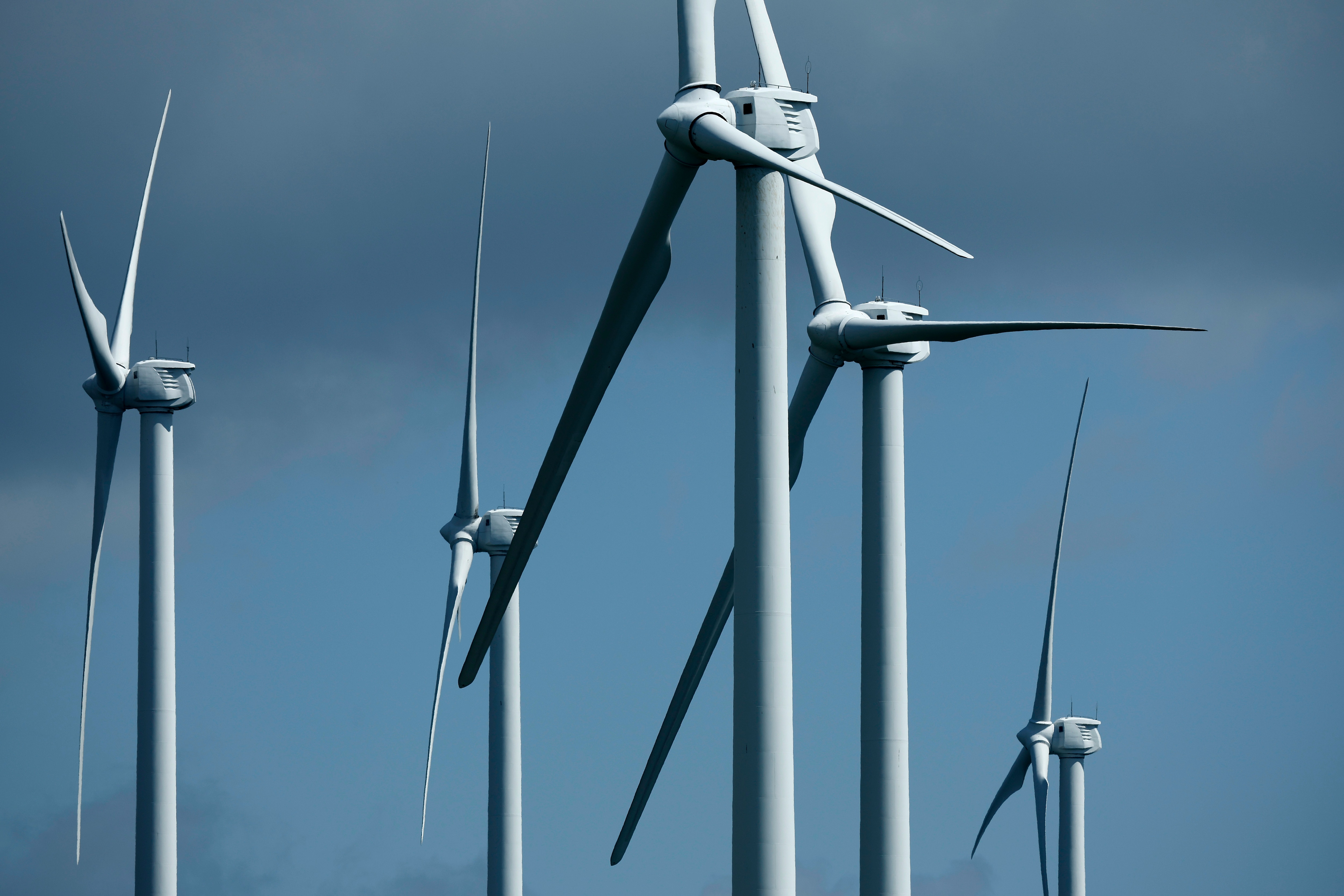 Turbines that are part of Constellation Energy's Criterion Wind Project stand along the ridge of Backbone Mountain on August 23, 2022 near Oakland, Maryland.