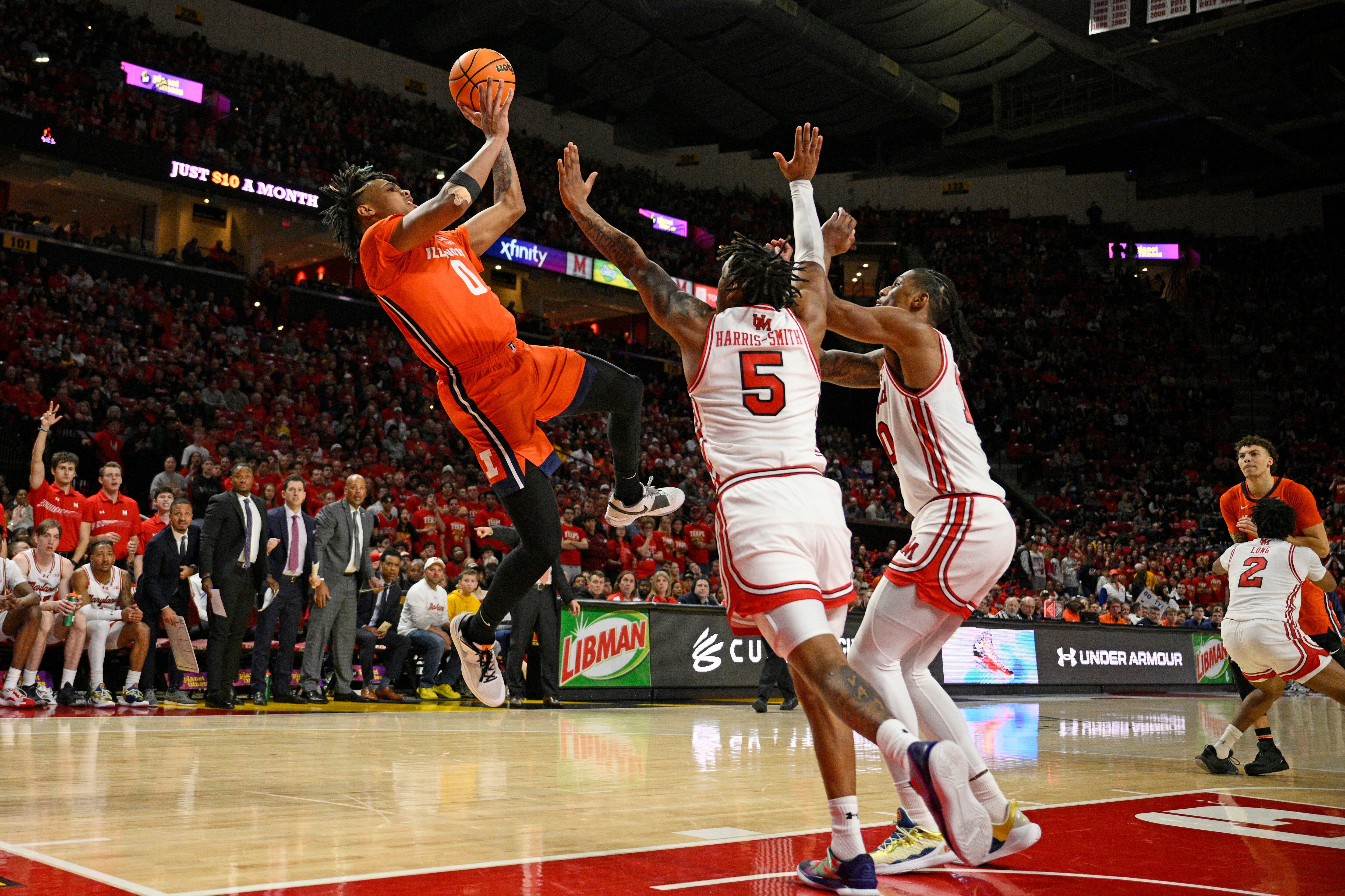 Illinois guard Terrence Shannon Jr. shoots against Maryland guard DeShawn Harris-Smith (5) and forward Julian Reese on Saturday in College Park.