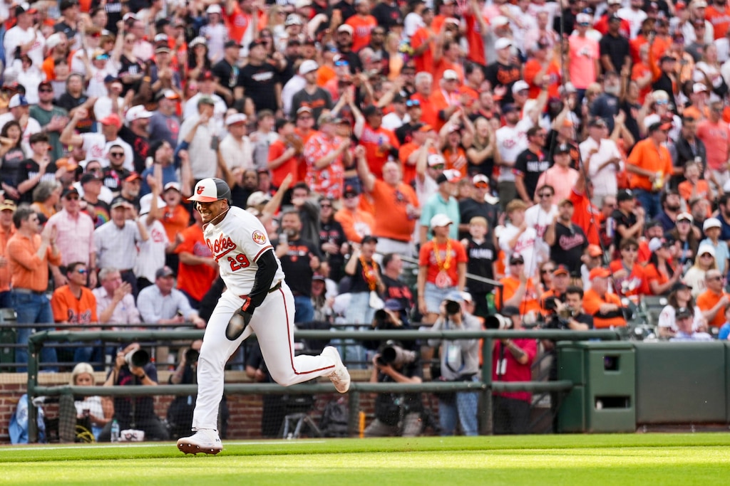 Designated hitter Samuel Basallo scores the Oriole’s first run of the season in the seventh inning of an opening-day baseball game against the Minnesota Twins at Camden Yards in Baltimore.