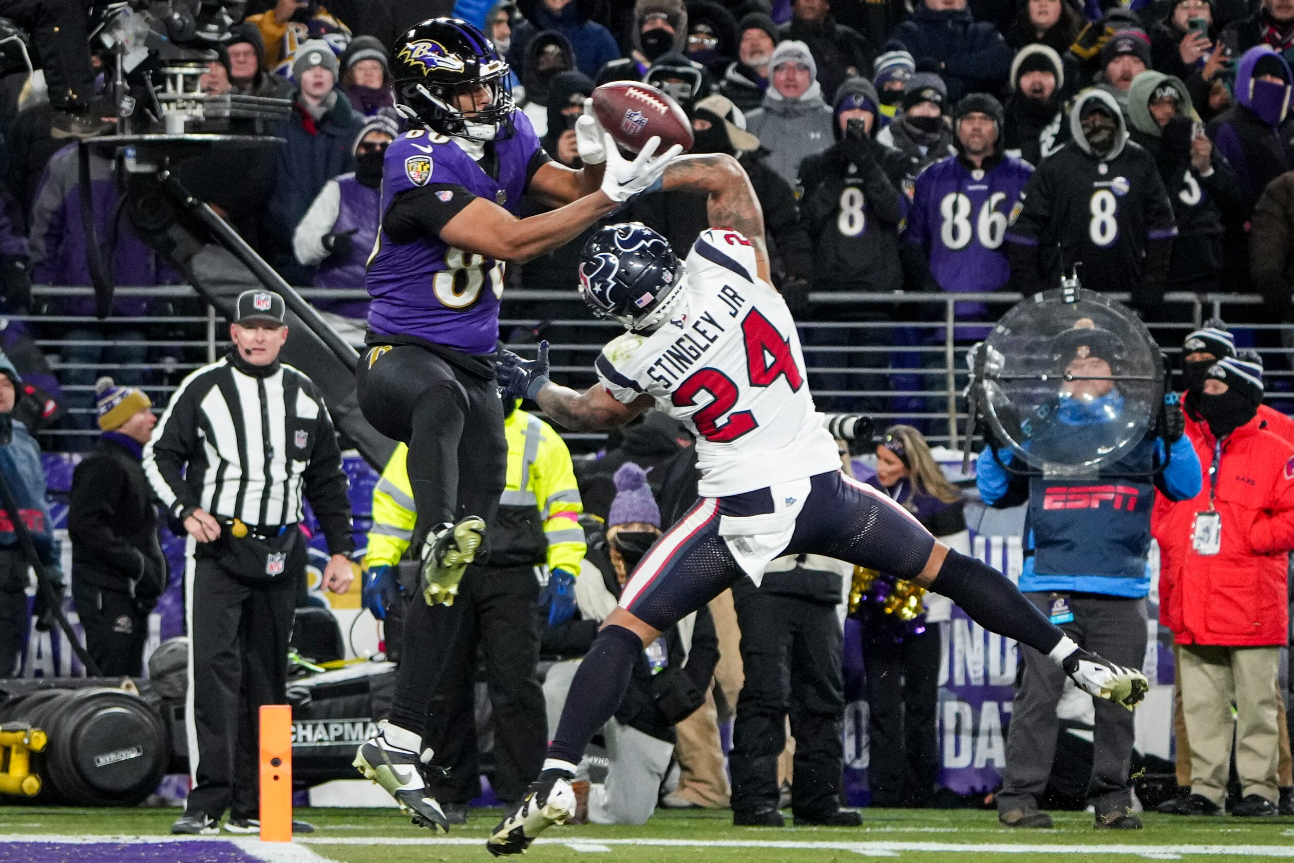 Ravens tight end Isaiah Likely catches a 15-yard touchdown pass over Houston Texans cornerback Derek Stingley Jr. in the first minute of the fourth quarter.