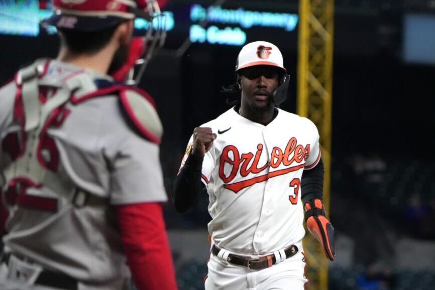 Jorge Mateo offers up a fist bump after scoring against the Red Sox at Camden Yards.