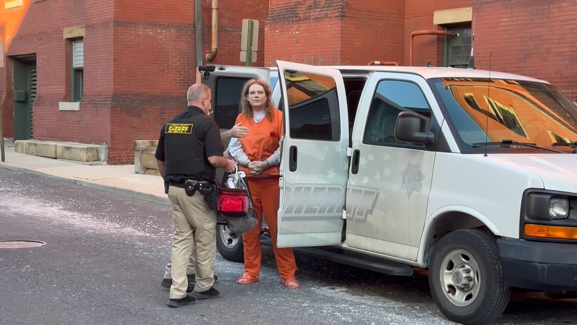 In this image from video, Jack LaSota, also known as Ziz, who is at the center of a cultlike group known as Zizians and linked to several deaths across the U.S., is escorted into court for a pretrial hearing on trespassing, gun and drug charges in Cumberland, Md., Friday, Jan. 16, 2026. (AP Photo/Mark Scolforo)