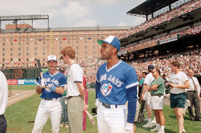 Toronto's Paul Molitor, left, and Devon White, right, wait their turn during batting practice during All-Star festivities in Baltimore in 1993.