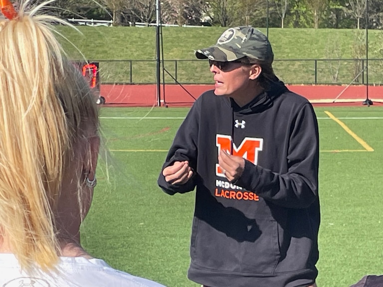 McDonogh coach Taylor Cummings advises her team during a timeout Tuesday as the Eagles went on to defeat No. 4 Glenelg Country School, 12-8. McDonogh is ranked No. 2 nationally behind Darien, Conn. in the Nike/USA Lacrosse Top 25.