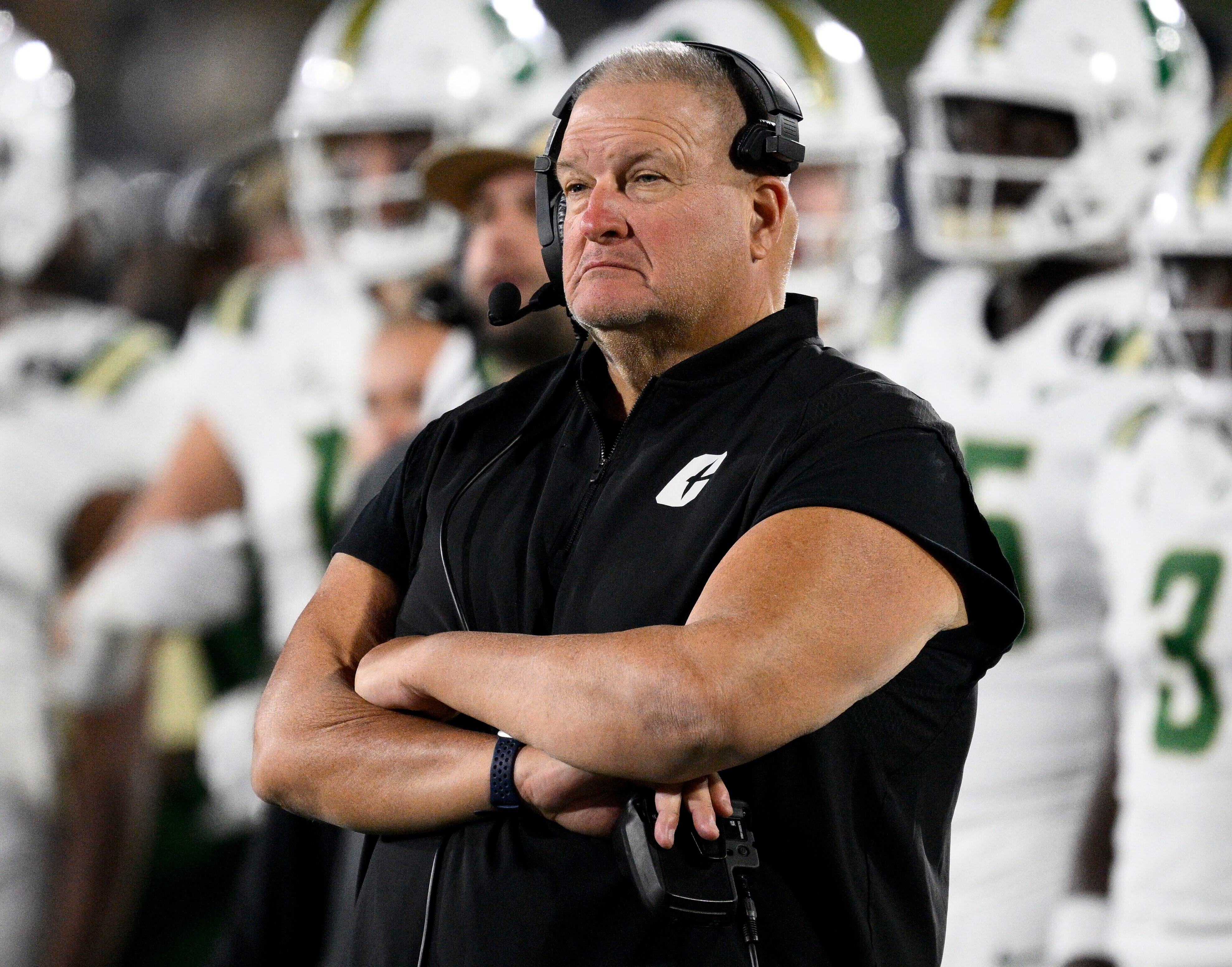 Charlotte head coach Biff Poggi watches the second half of an NCAA college football game against Navy, Oct. 19, 2024, in Annapolis, Md.