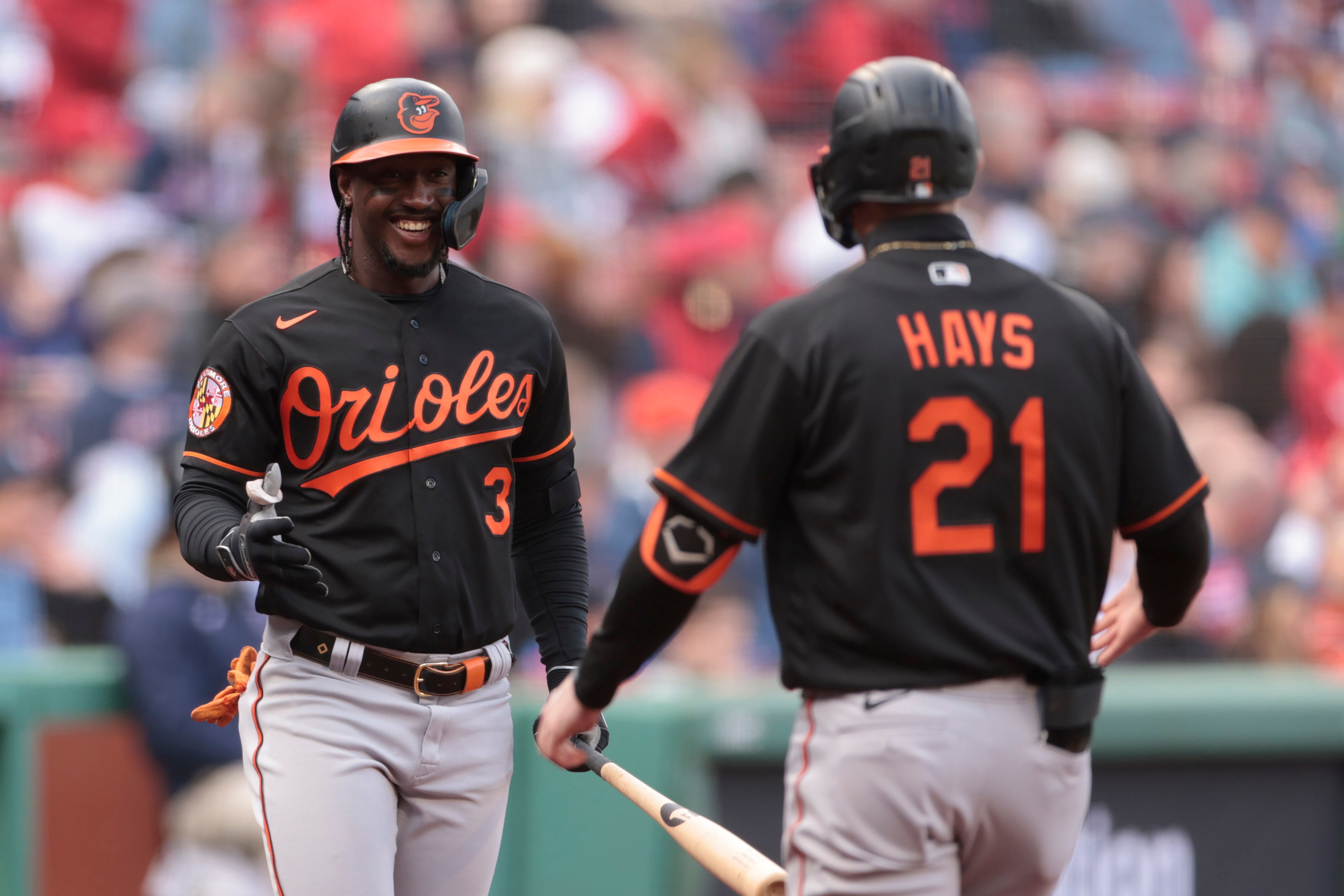 BOSTON, MASSACHUSETTS - APRIL 01: Jorge Mateo #3 of the Baltimore Orioles reacts with Austin Hays #21 of the Baltimore Orioles during the first inning against the Boston Red Sox at Fenway Park on April 01, 2023 in Boston, Massachusetts. (Photo by Nick Grace/Getty Images)