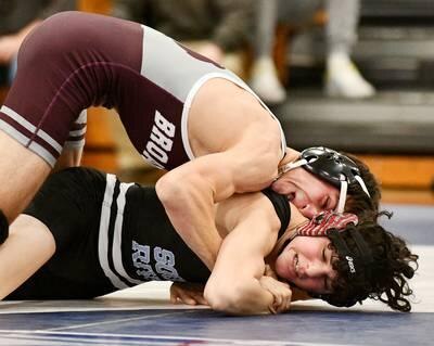 Broadneck's Ben Durkin (top) had his way with South River's Sam Travis during Wednesday's Anne Arundel County wrestling dual match. Durkin won by pin as the Bruins defeated the reigning Class 3A state champ Seahawks, 40-25, in Edgewater.