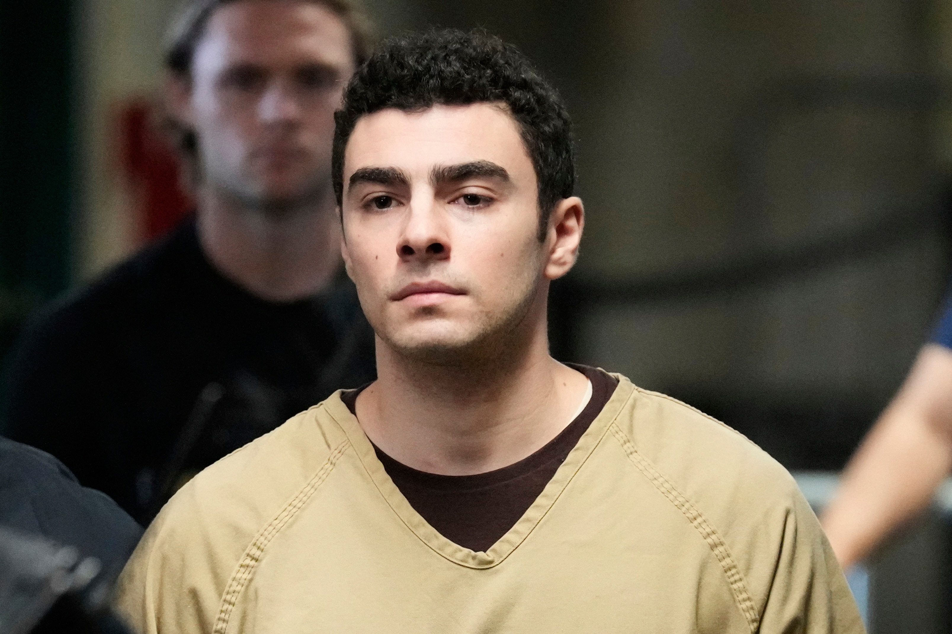 Luigi Mangione is escorted into Manhattan state court in New York, Tuesday, Sept. 16, 2025. (AP Photo/Seth Wenig)