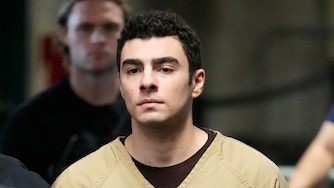 Luigi Mangione is escorted into Manhattan state court in New York, Tuesday, Sept. 16, 2025. (AP Photo/Seth Wenig)